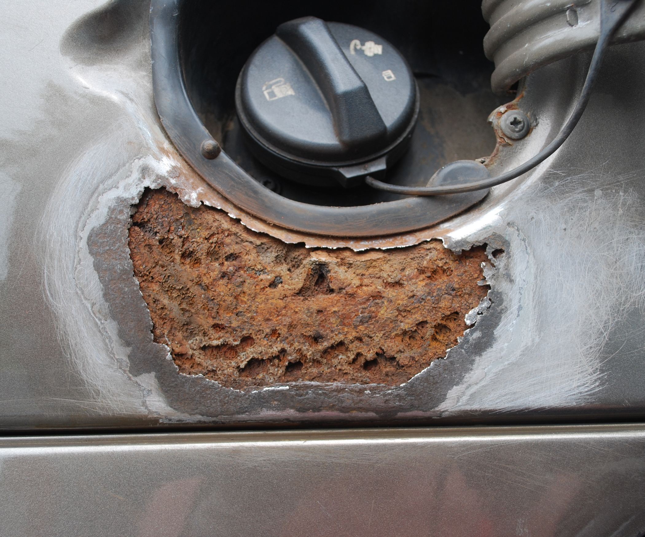 Repairing a Rust Hole in a Car