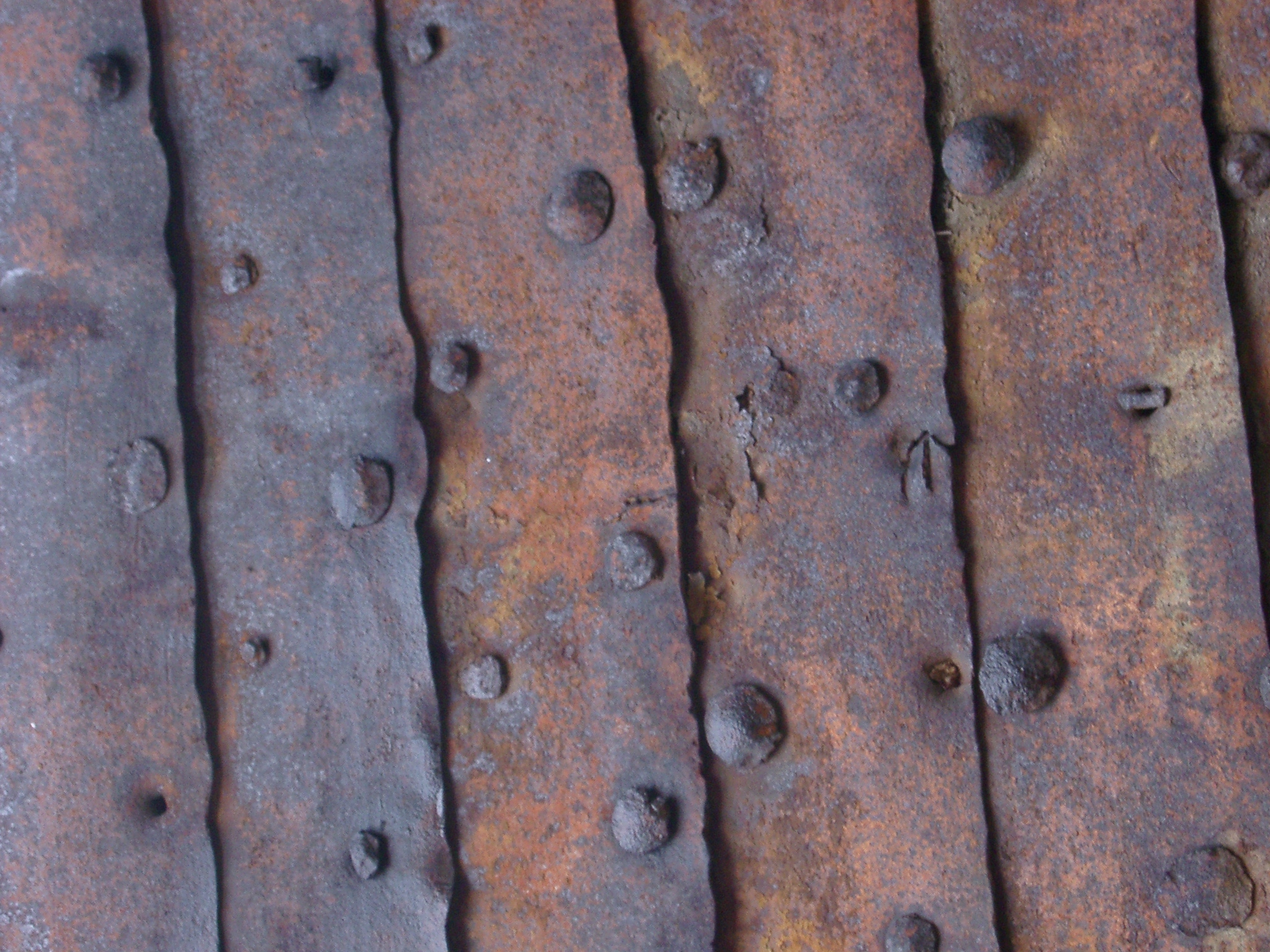 Free Stock Photo 172-rusted_rivets_1402.JPG | freeimageslive