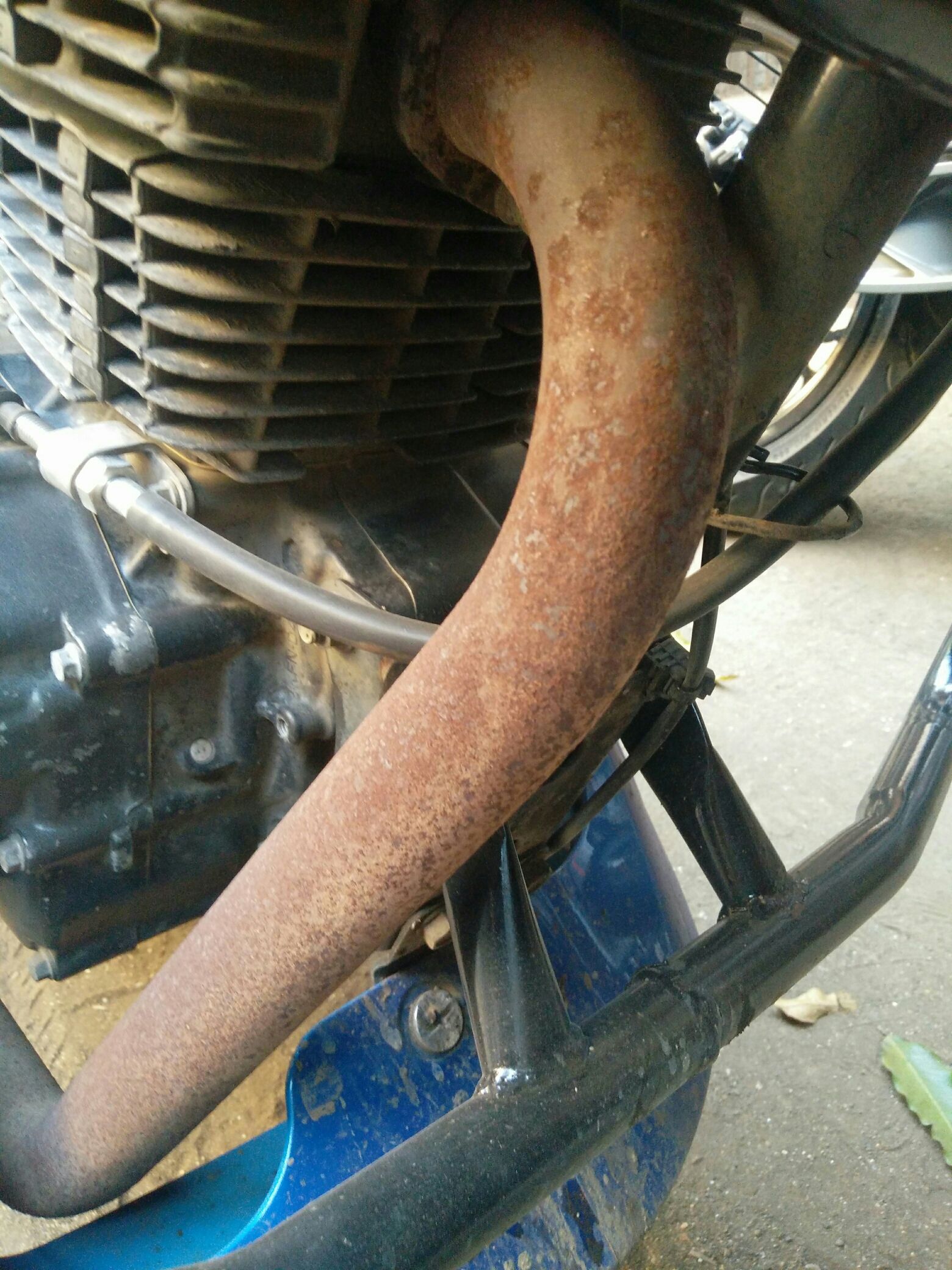 Exhaust rust removal and coating