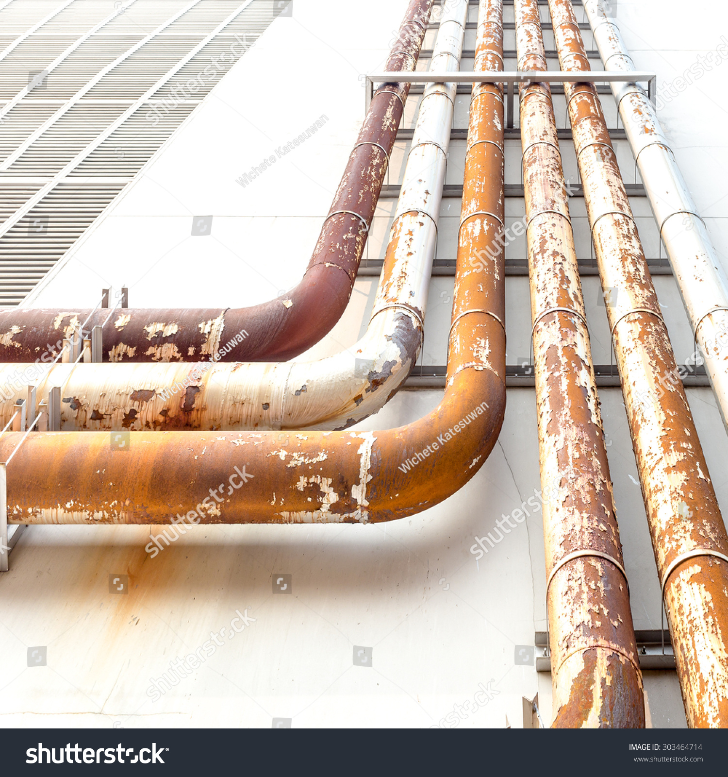 Rusted Water Pipe Over Building Stock Photo & Image (Royalty-Free ...