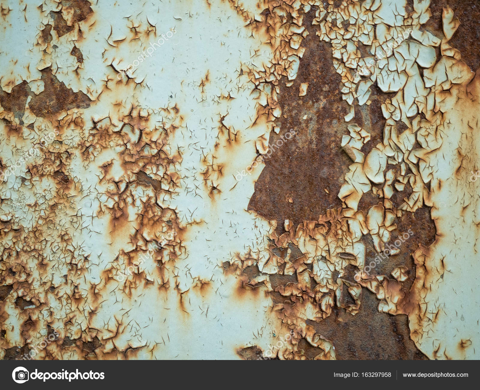 Texture of old rusty metal with streaks of rust and cracked, flaking ...