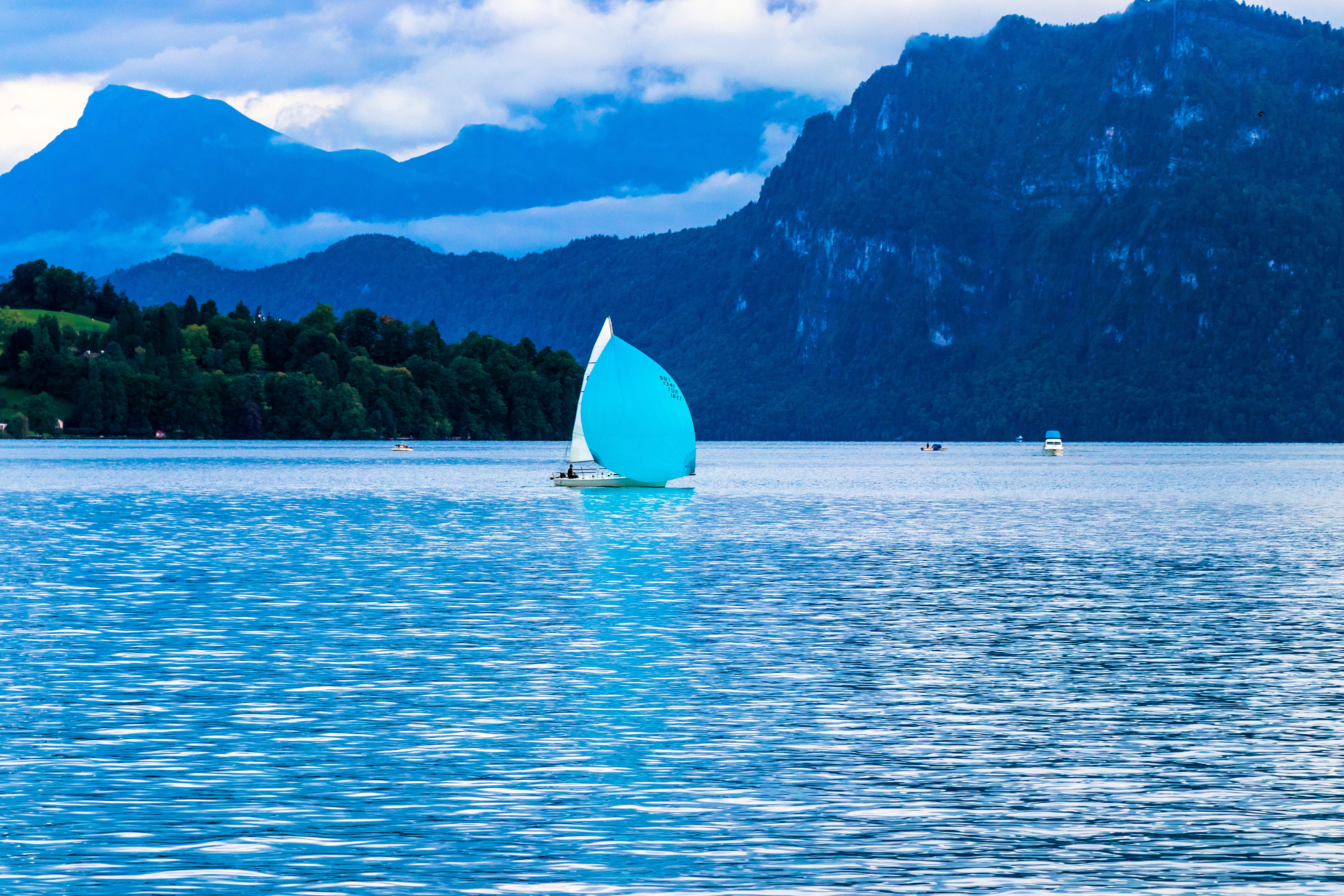 Sailing boat on body of water photo