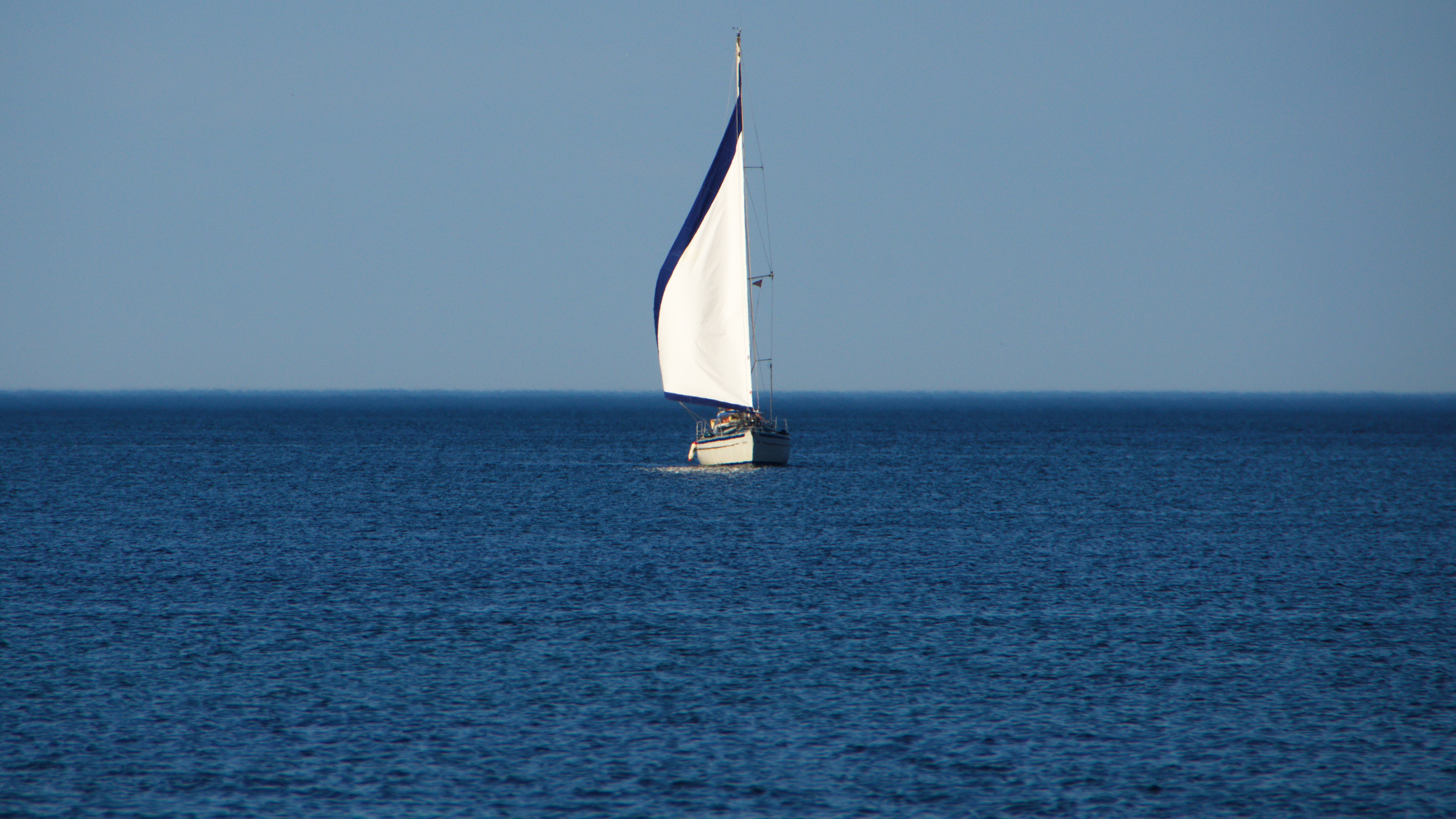 Sailing ship in the ocean photo