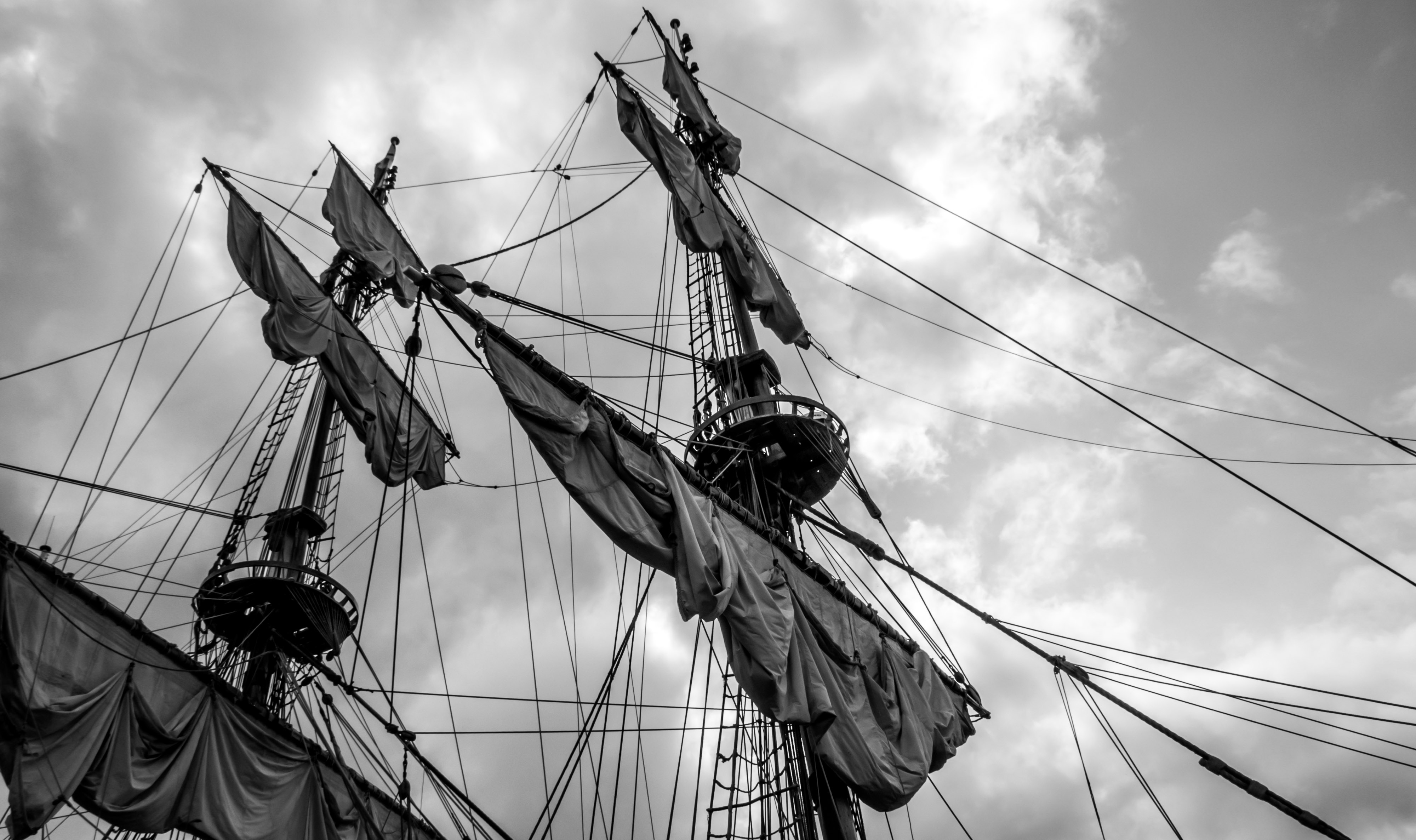 Sailing ship's masts with sails photo