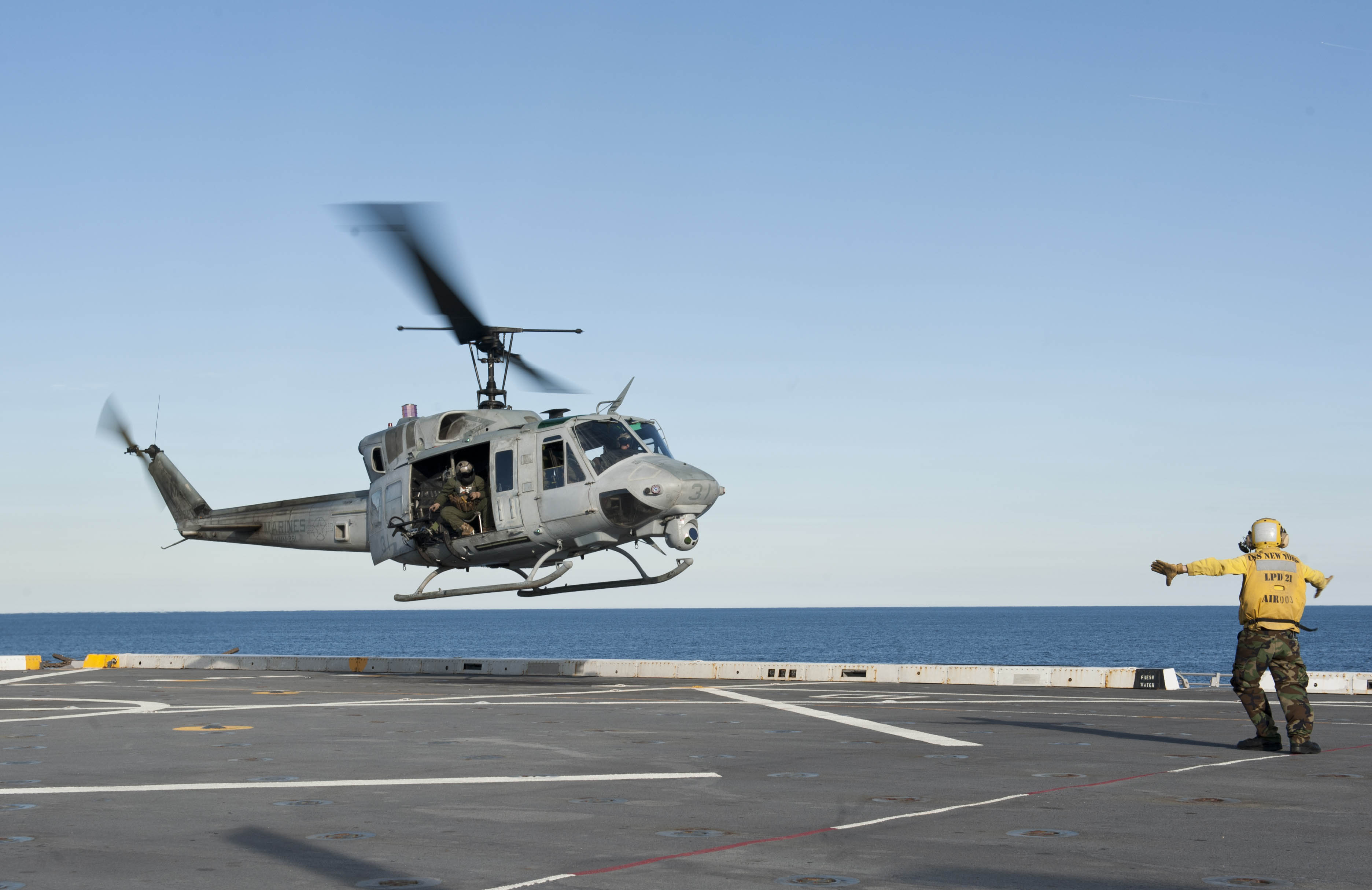 File:US Navy 120131-N-XK513-120 A Sailor directs a UH-1N Huey ...
