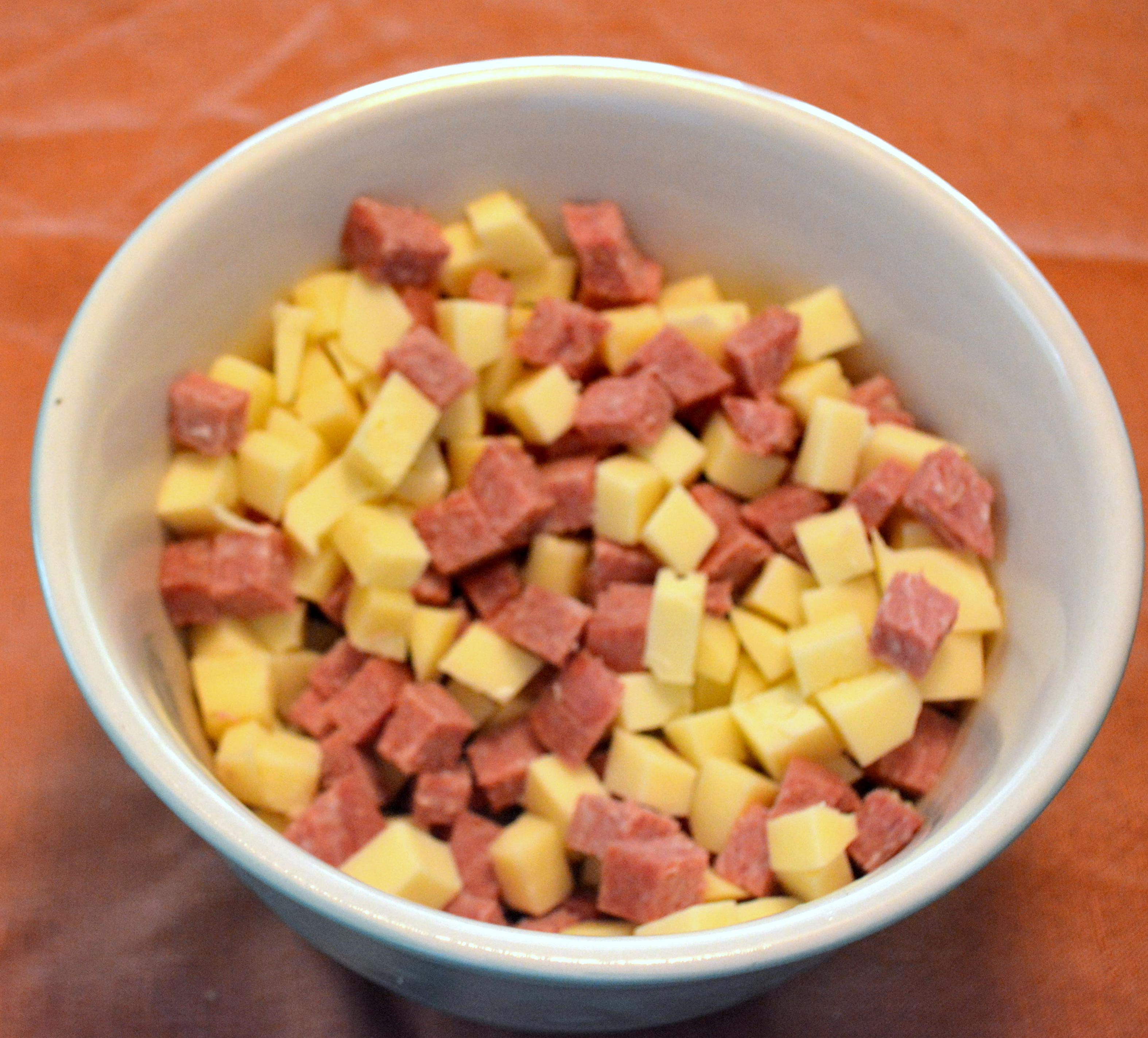 Salami and cheese in squares photo