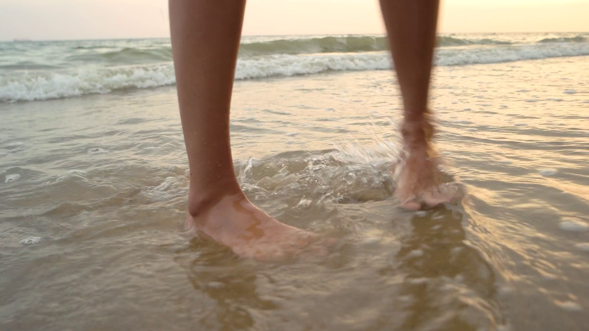 Womans feet standing and walking in the wet sand Stock Video Footage ...