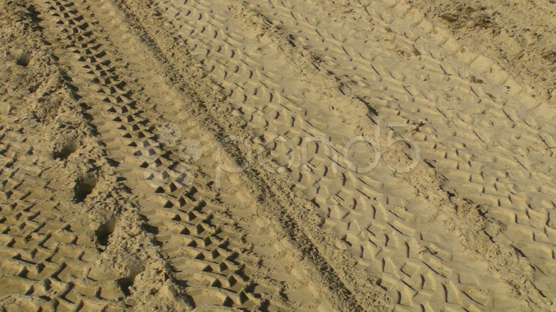 Tire tracks in sand ~ HD & 4K Stock Footage #8974563 | Pond5