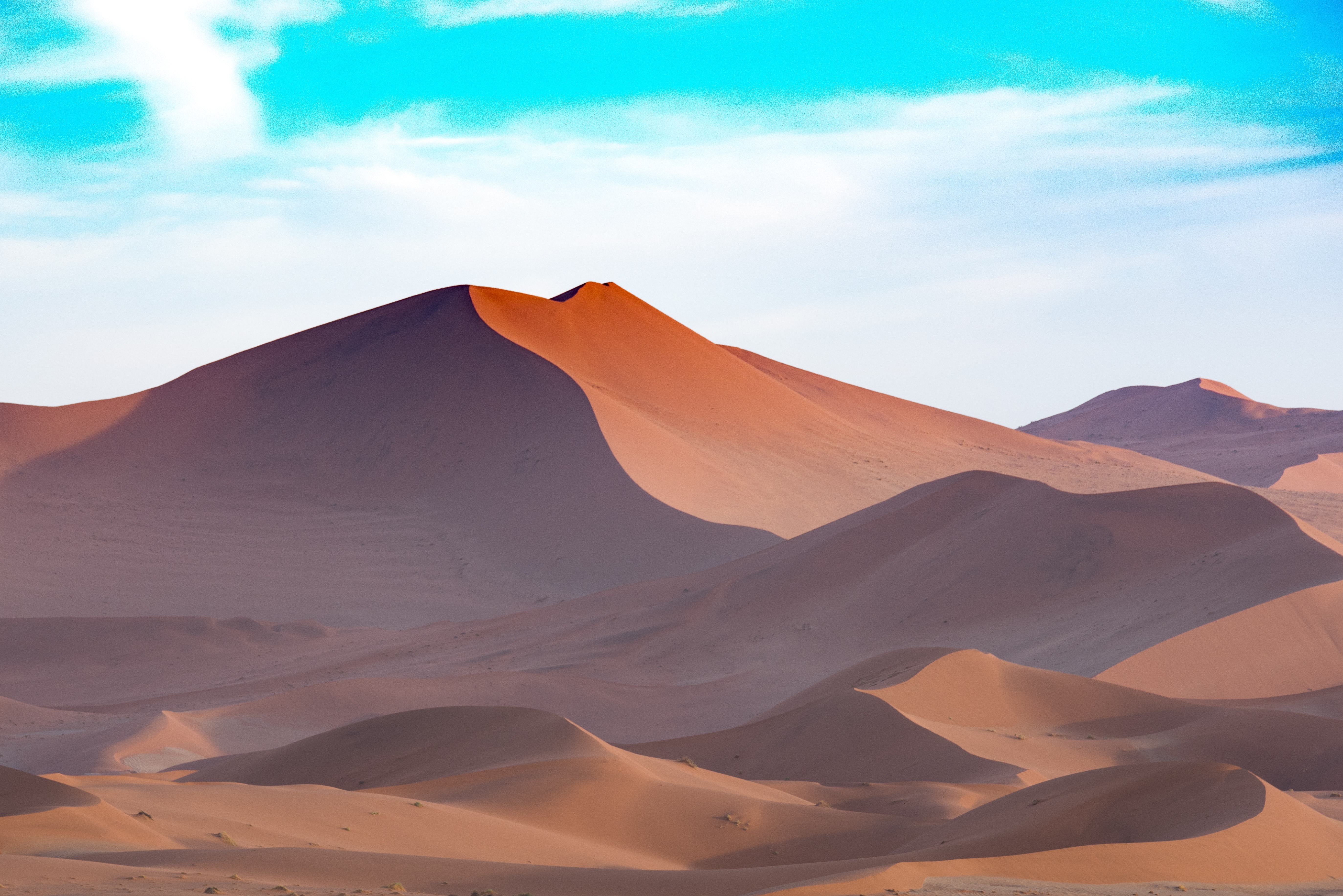 Scenic view of desert against sky photo