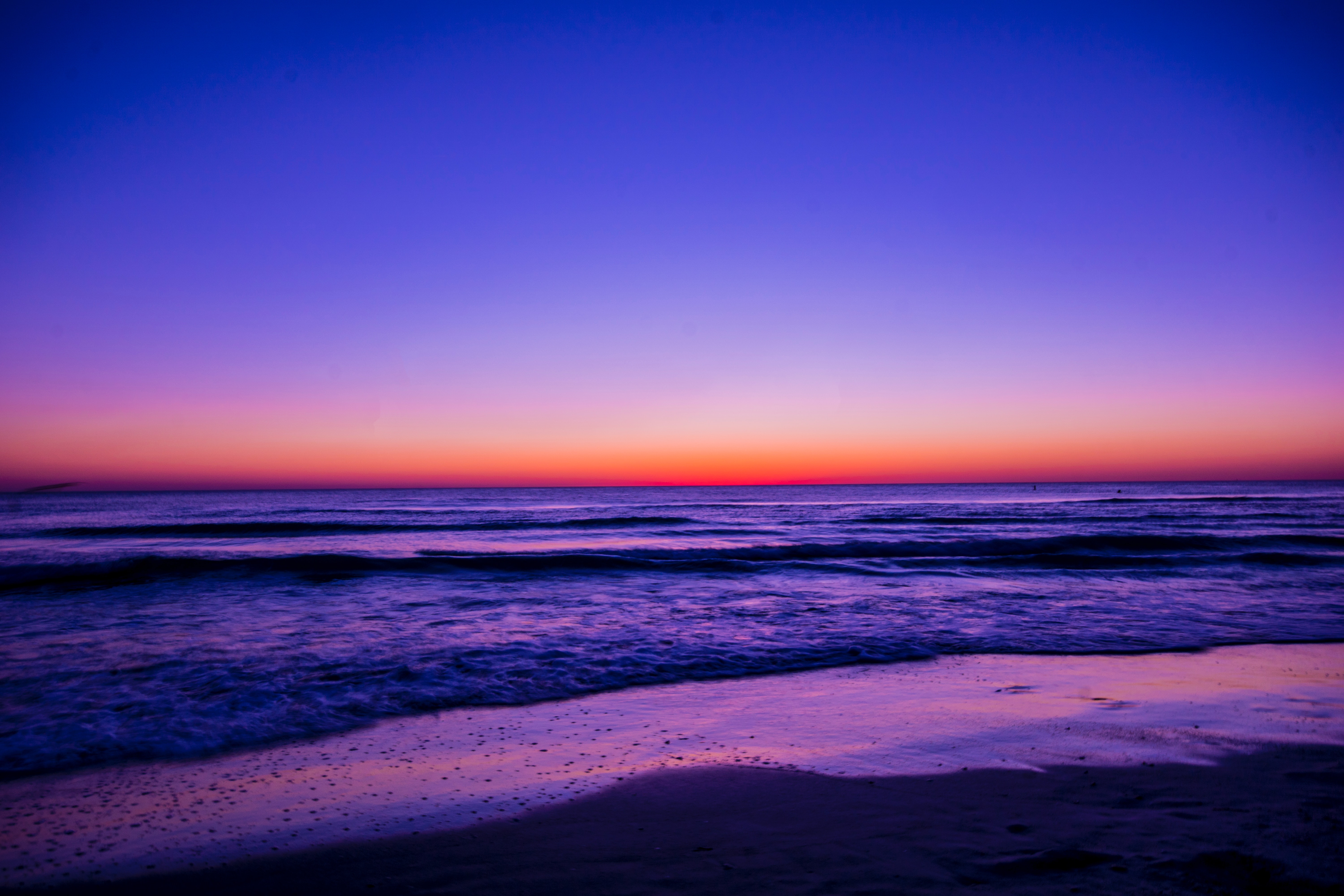 Scenic view of ocean during dawn photo