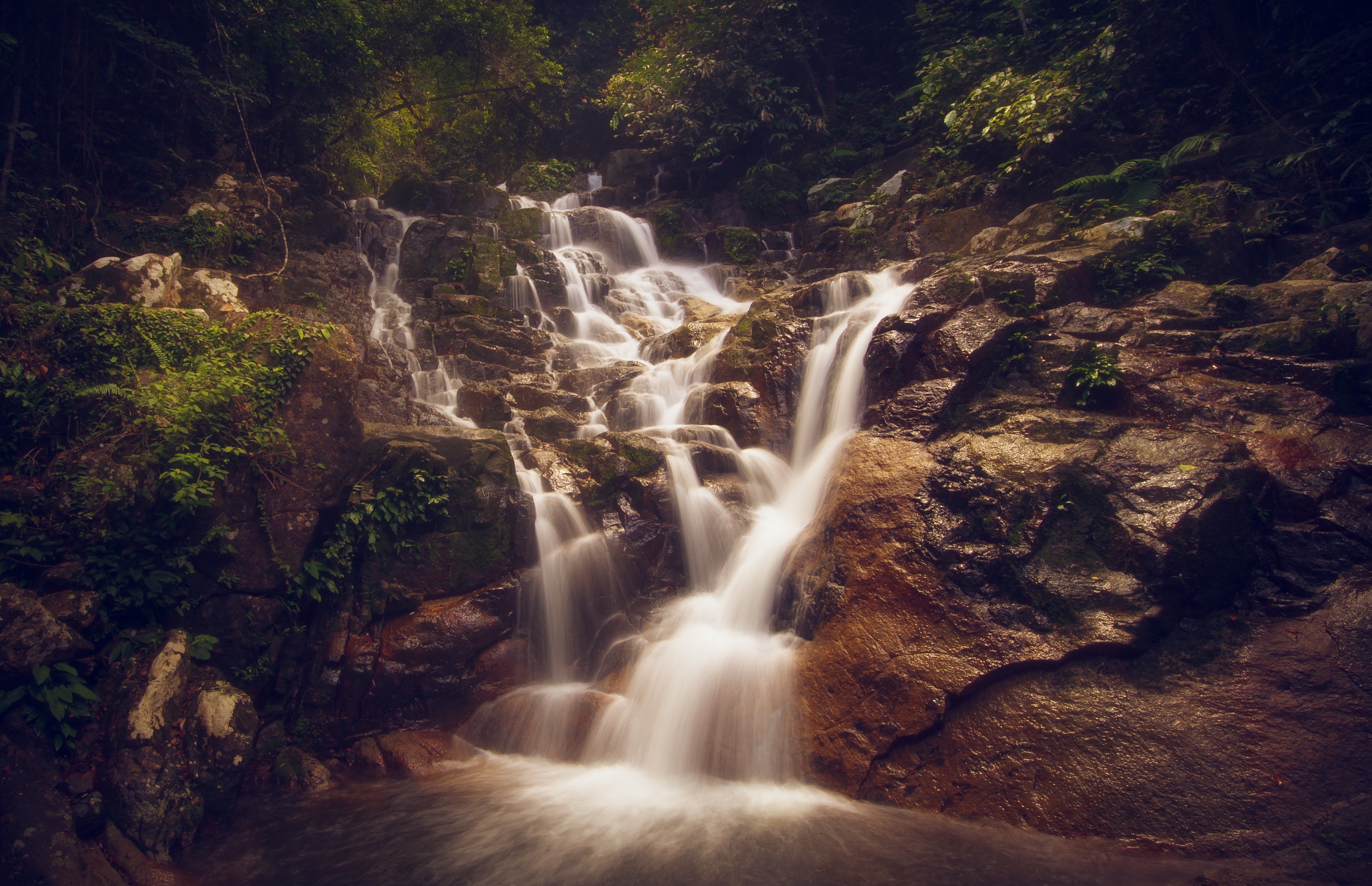 Scenic view of waterfall photo