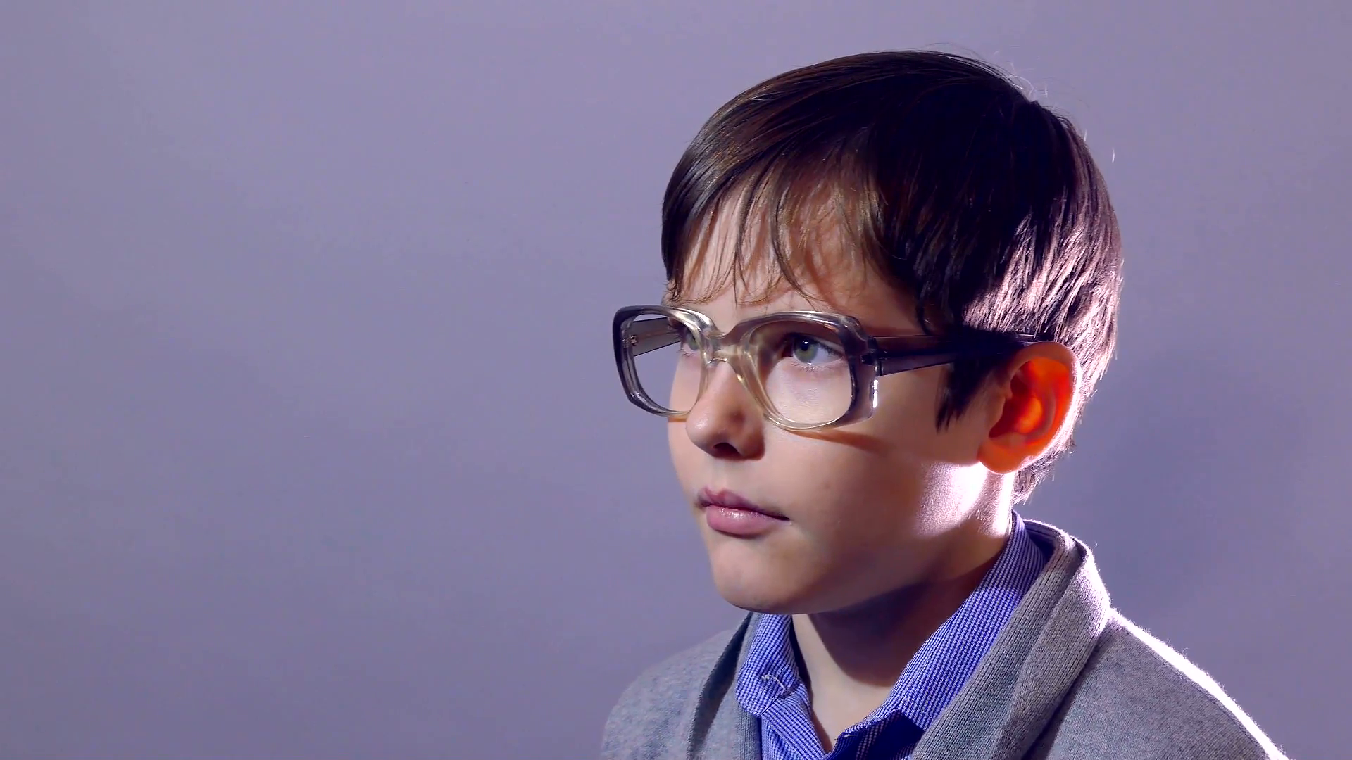 boy nerd teenager portrait schoolboy glasses on purple background ...