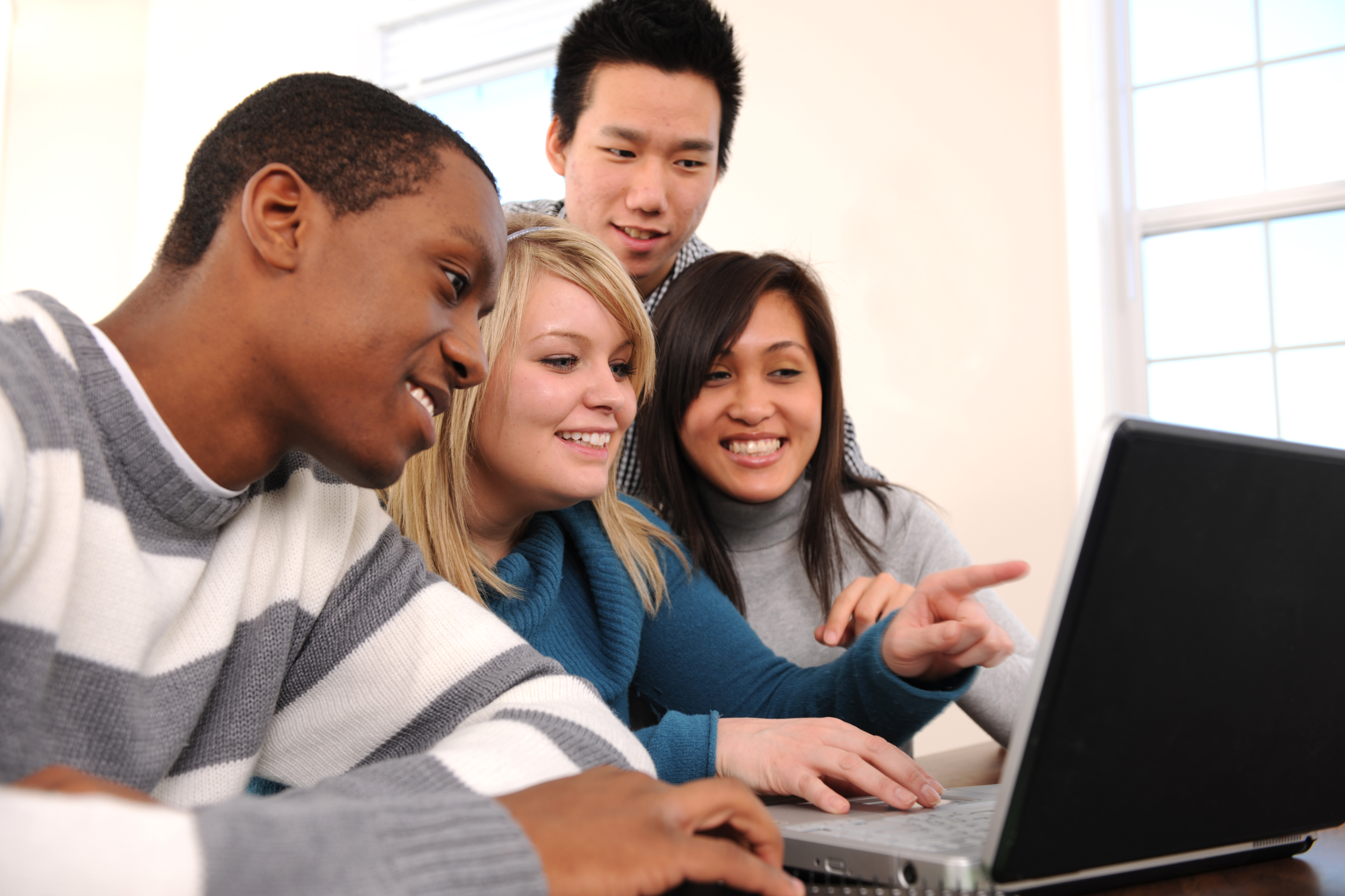 1030 - School 4 High School Students Studying on a Laptop - NPCC, Inc.
