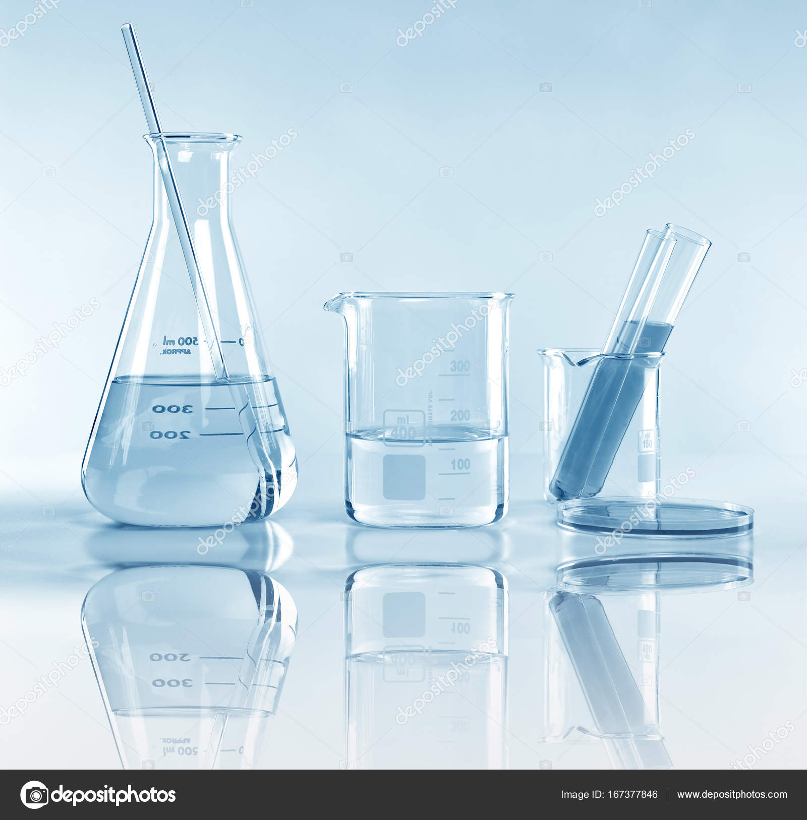 Scientific laboratory experimental glassware with clear solution ...