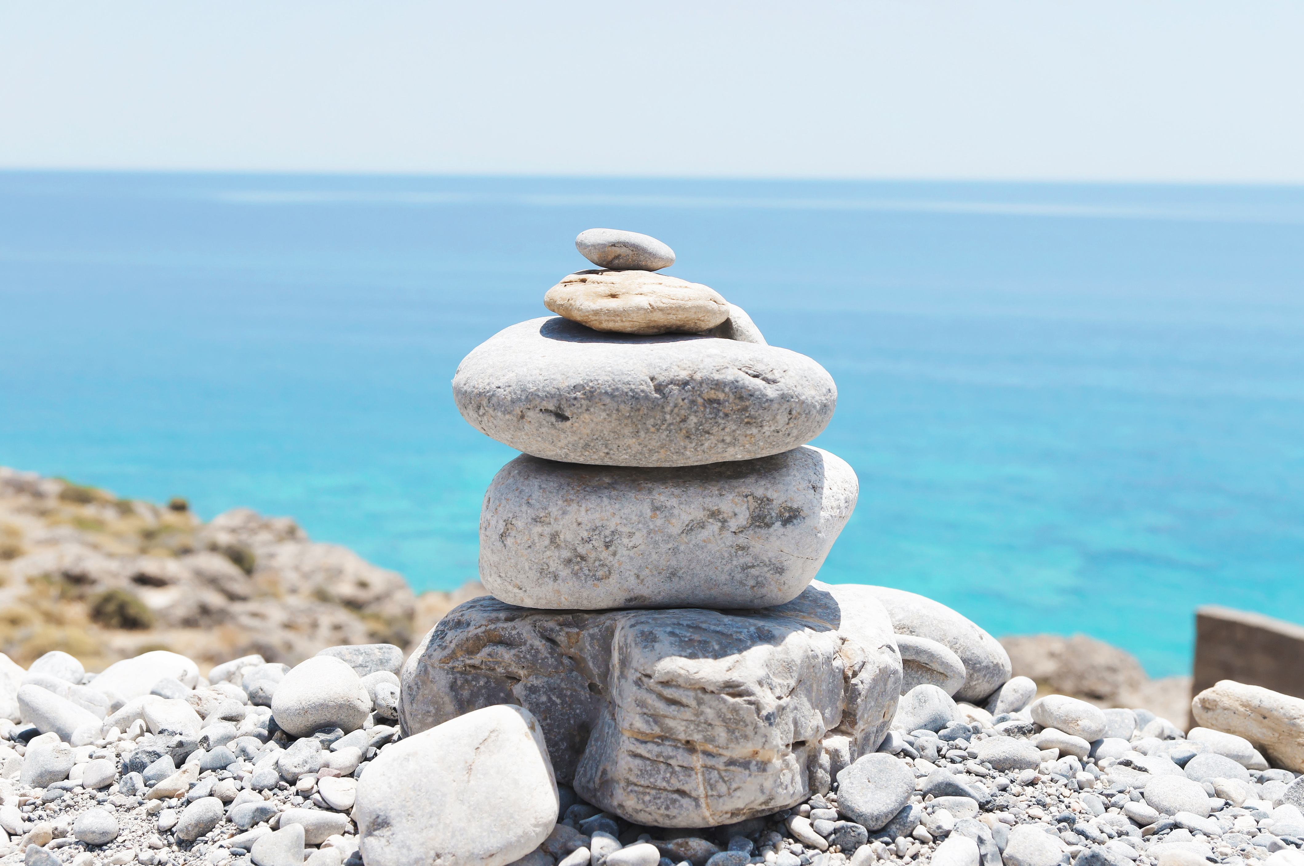 Balanced stack of stones over sea background - Our Great Photos