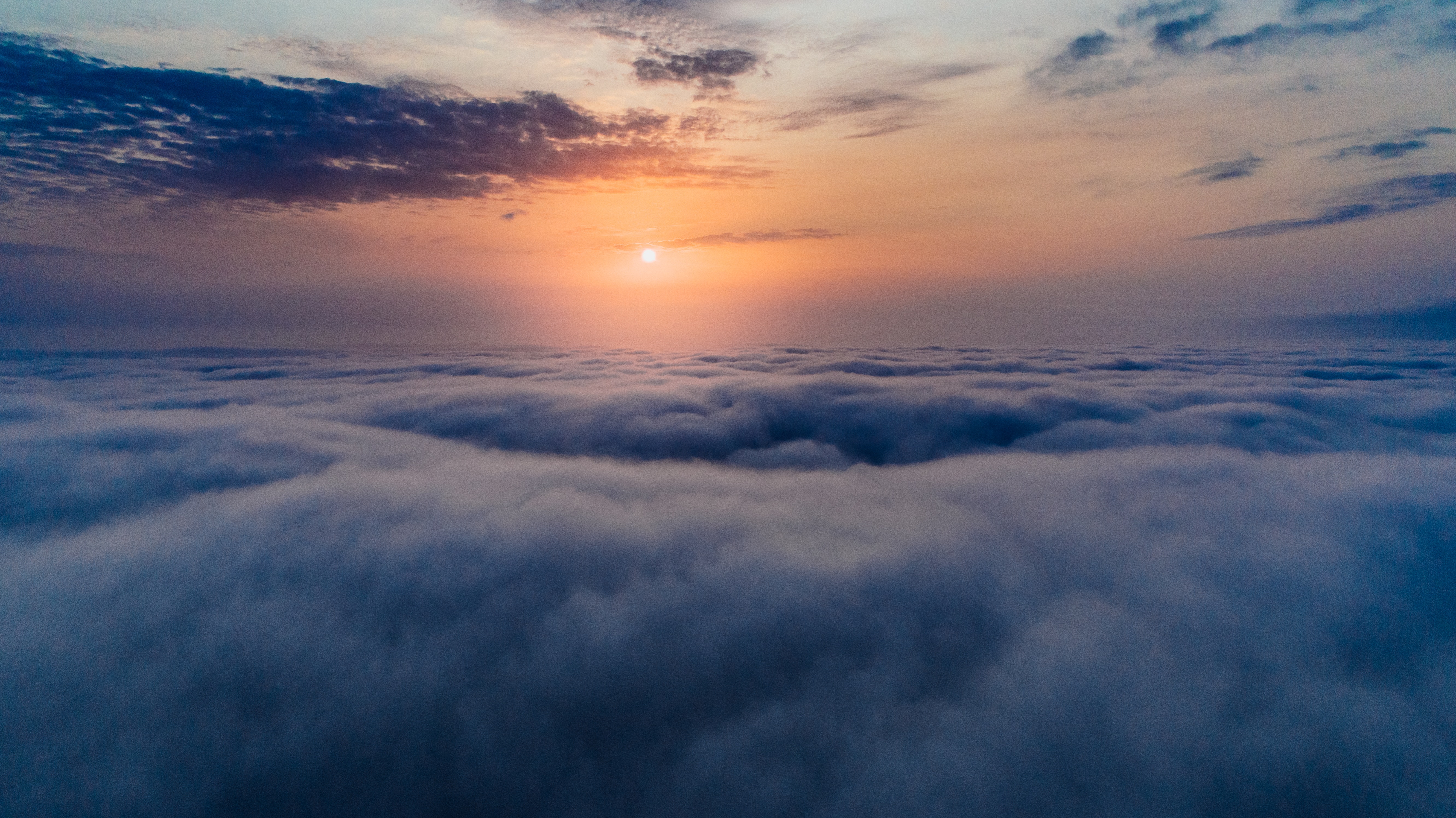 Sea of clouds during sunset photo