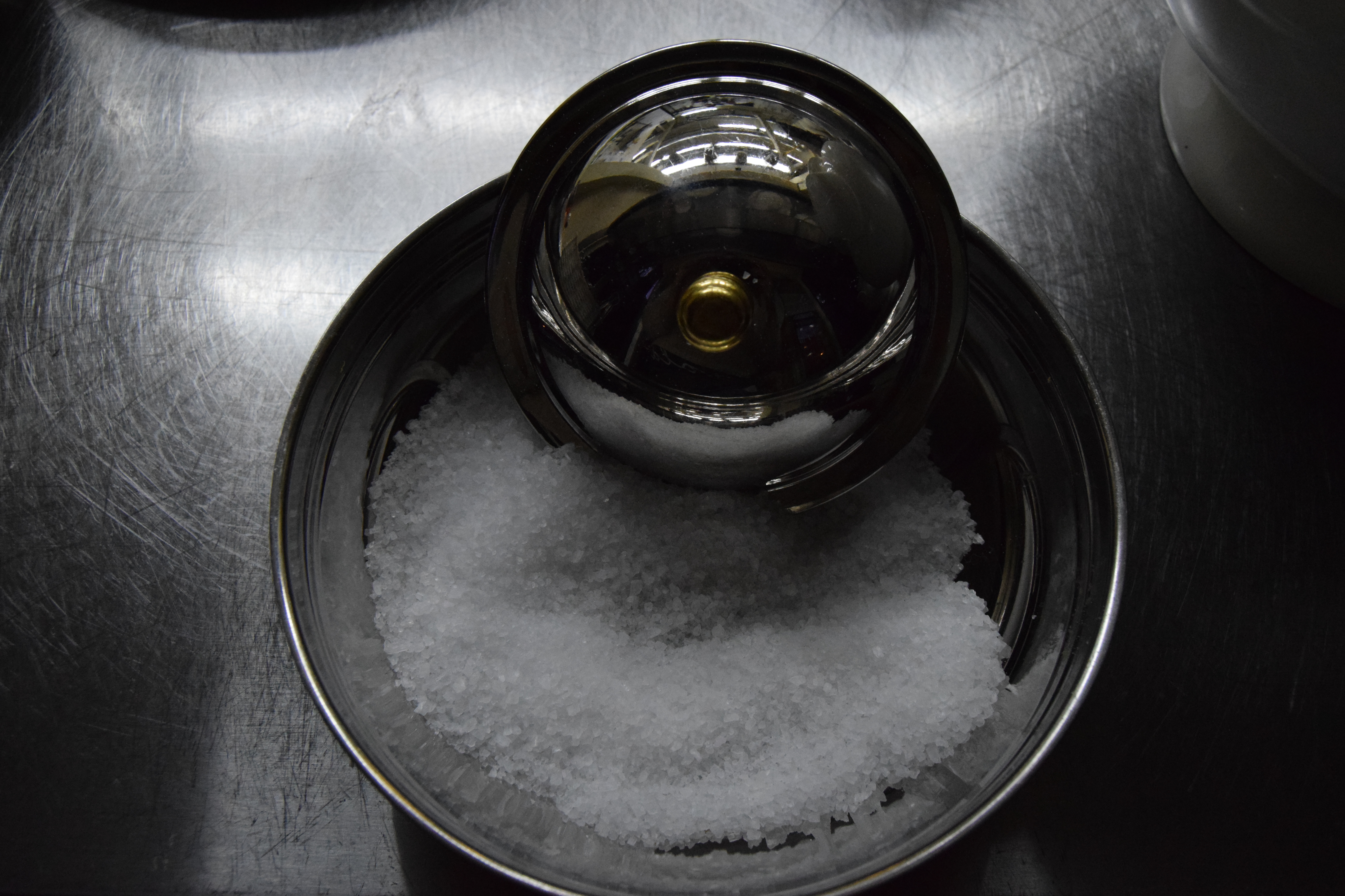 Sea ​​salt in an iron plate photo