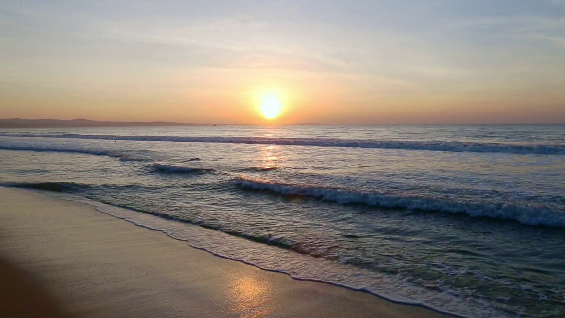 Sea scenery golden sunrise over horison. Dark waves go to sandy ...