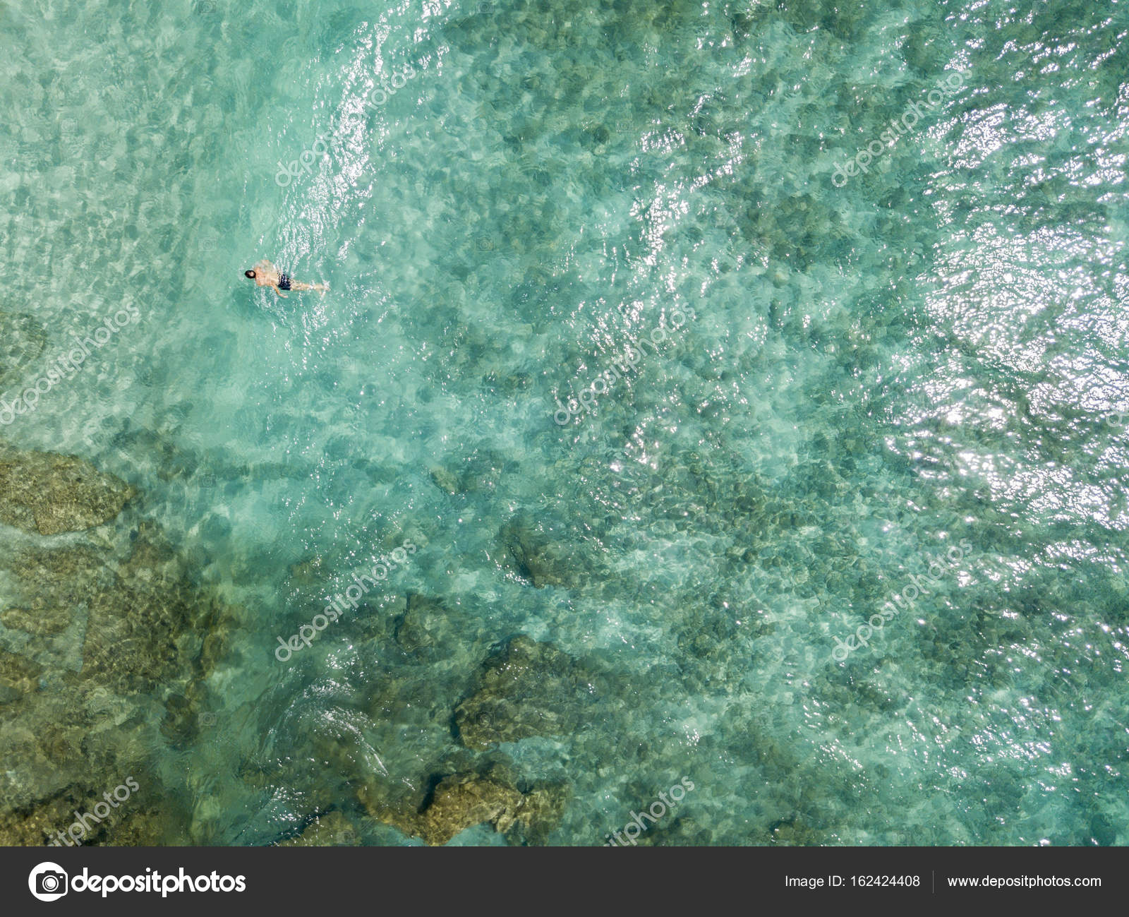 Aerial view of rocks on the sea. Overview of seabed seen from above ...