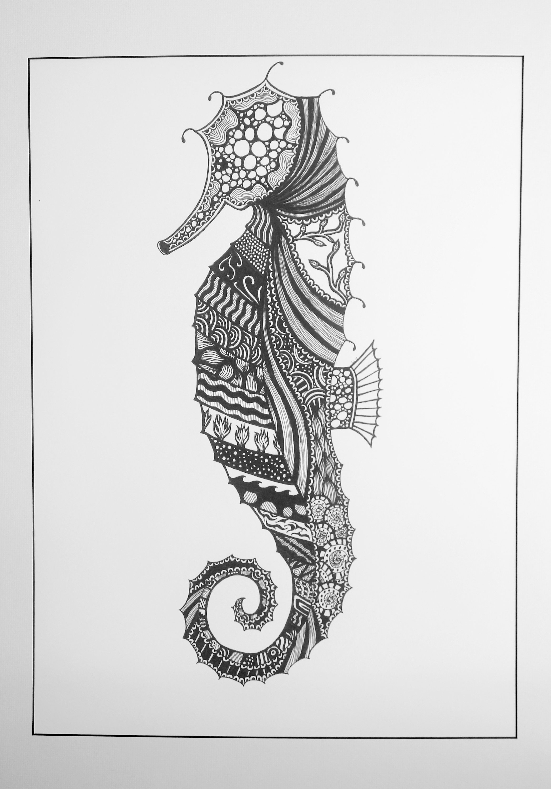 Intricate seahorse drawing.