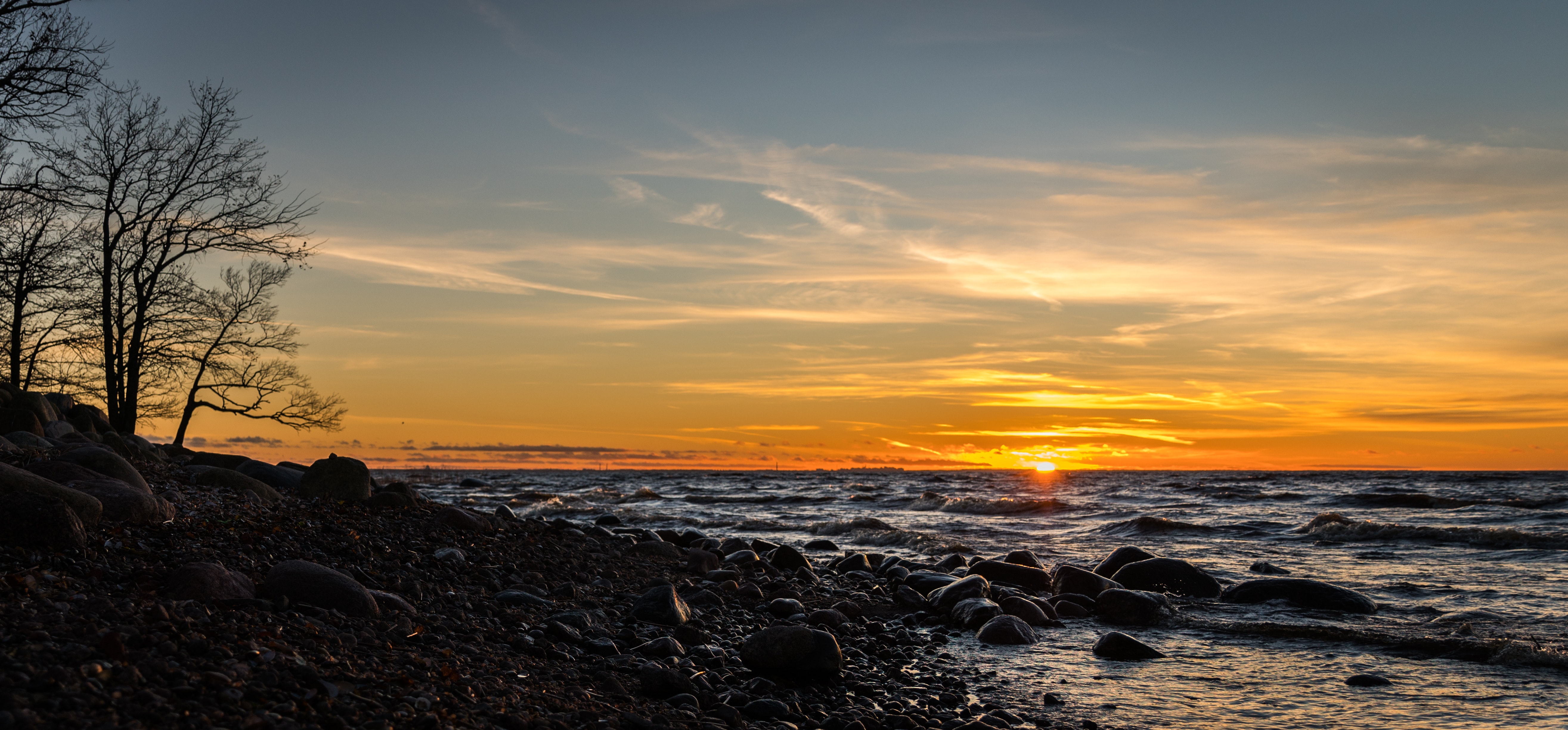 Seashore photo shot during sunset