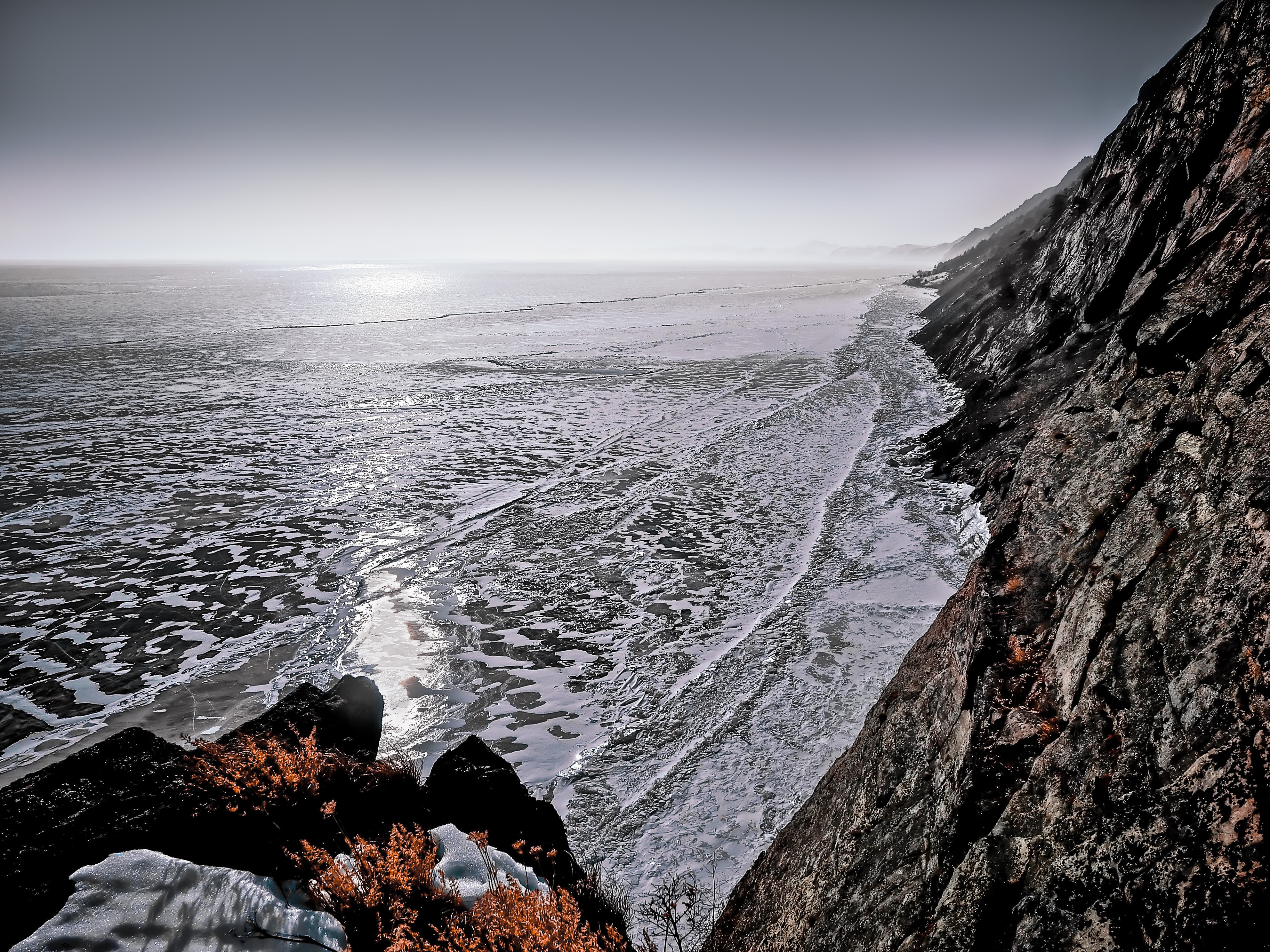 Seawaves on gray rock formation photo