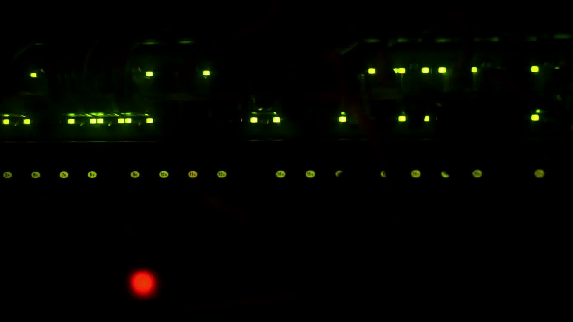 Network server switch LED blink in dark room. Green and red lights ...