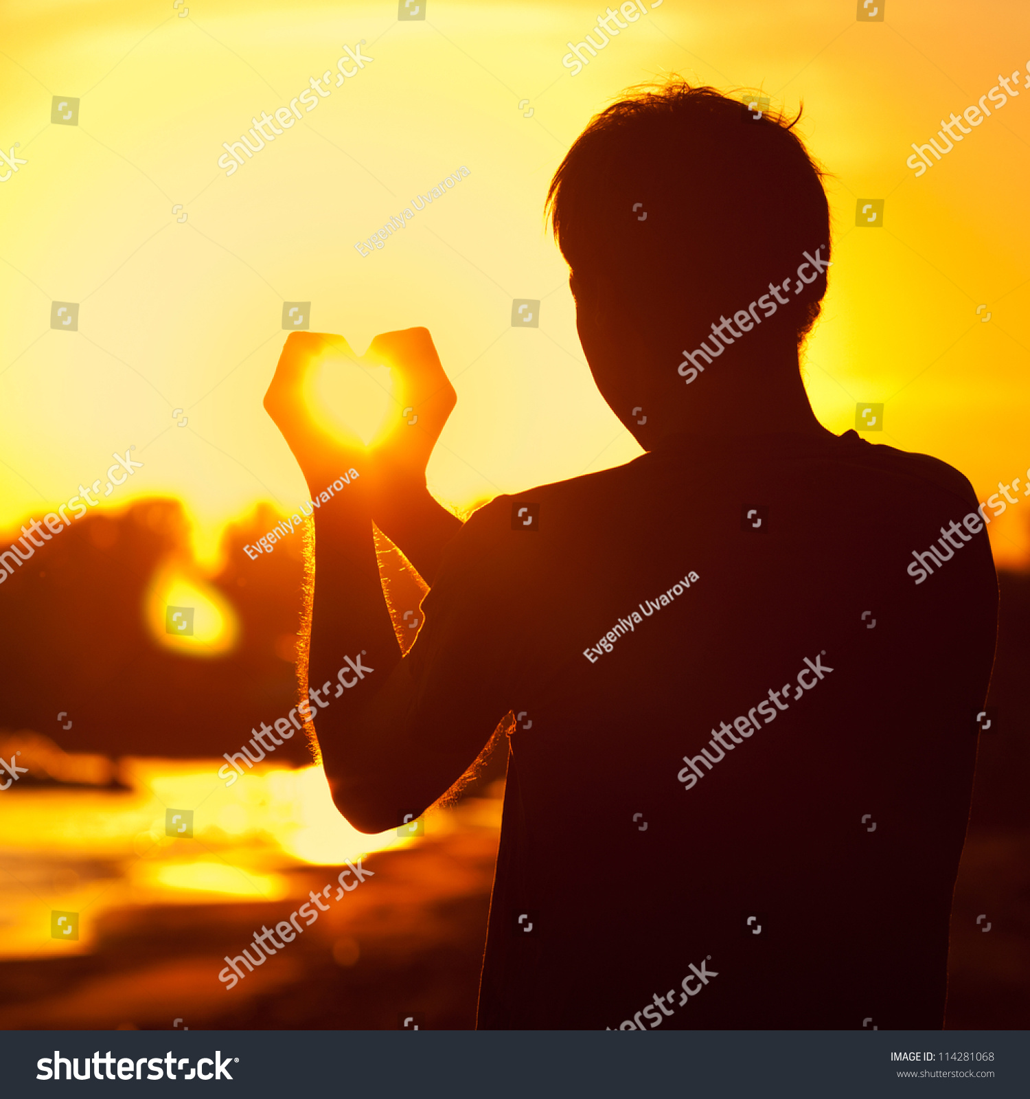 Young Man Holding Hands Setting Sun Stock Photo (Safe to Use ...