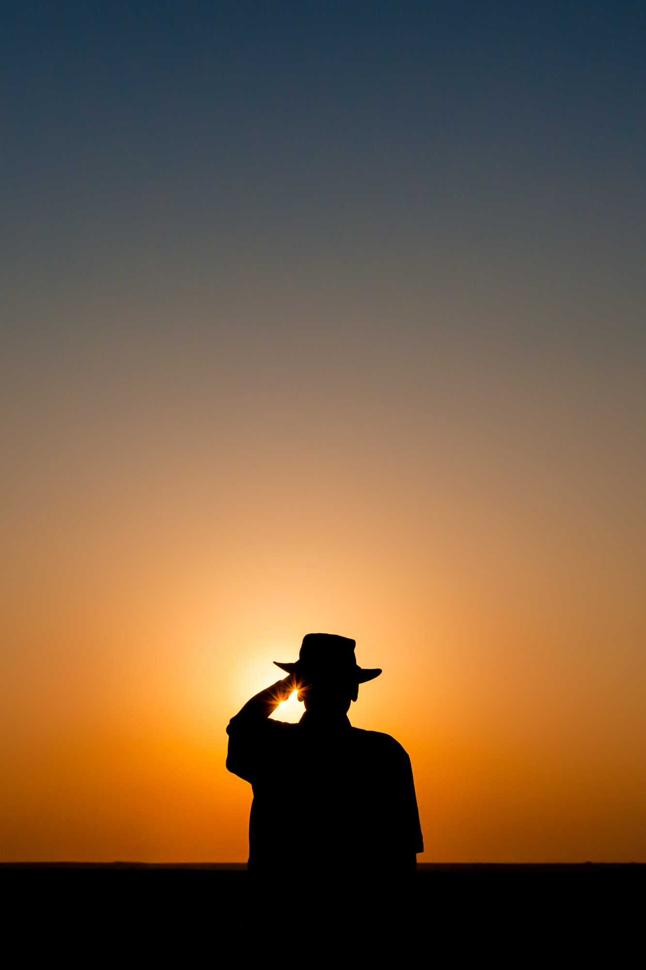 Farmer staring at setting sun - Melrose, New Mexico - Fred Wasmer ...