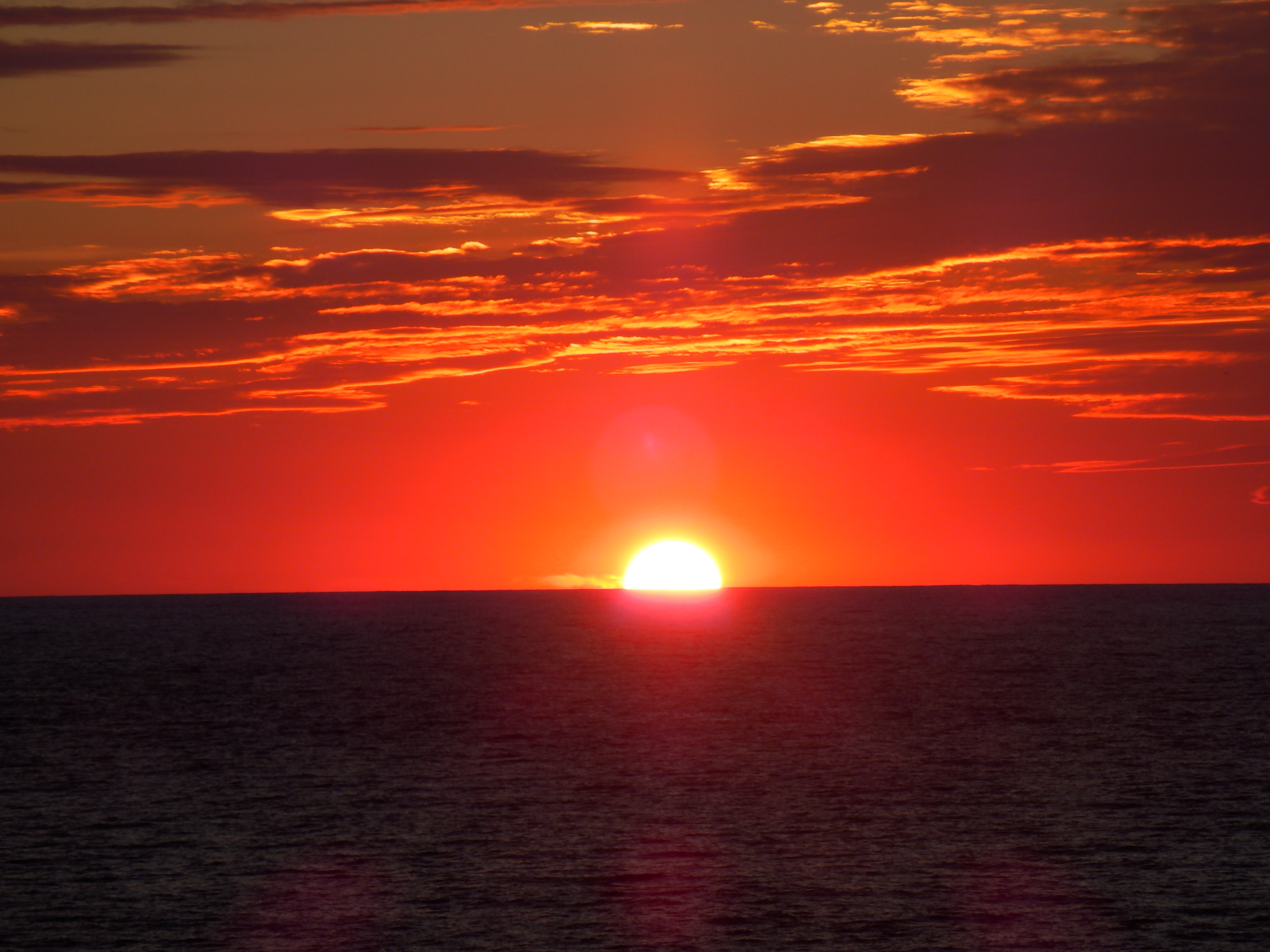 Photo Friday: Sun Setting on the Sea – wendy {dot} blog