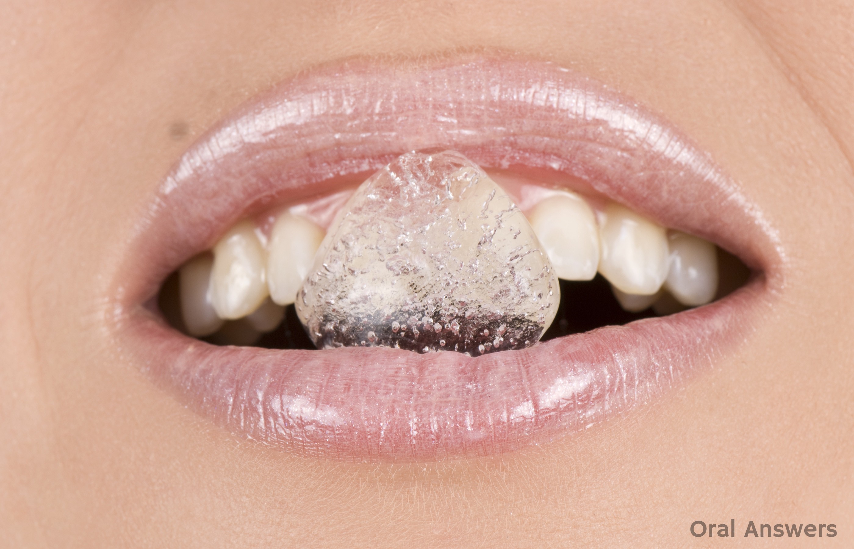 How Chewing Ice Cubes Hurts Your Teeth | Oral Answers