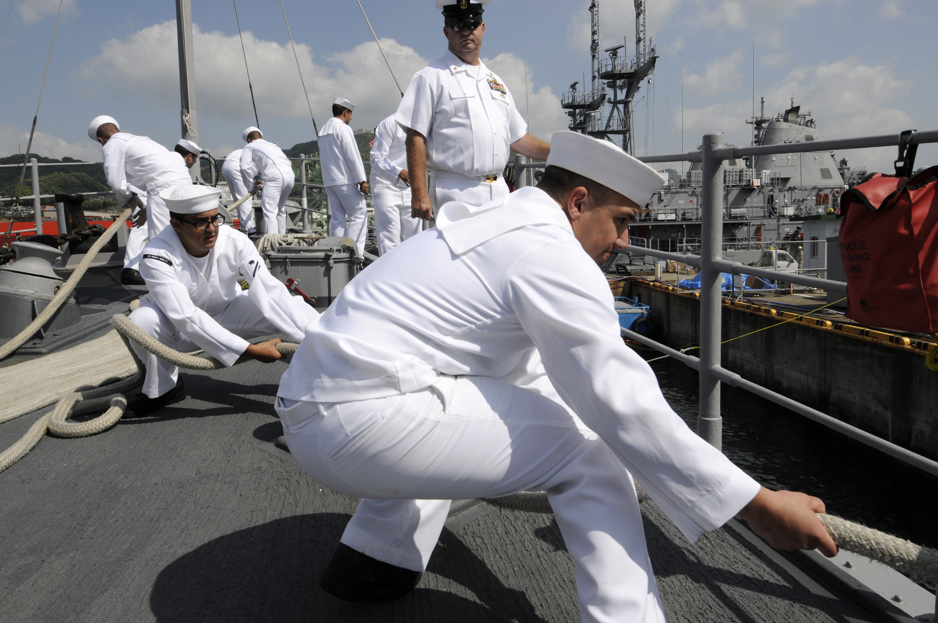 File:US Navy 100512-N-8335D-157 Sailors heave on mooring lines as ...