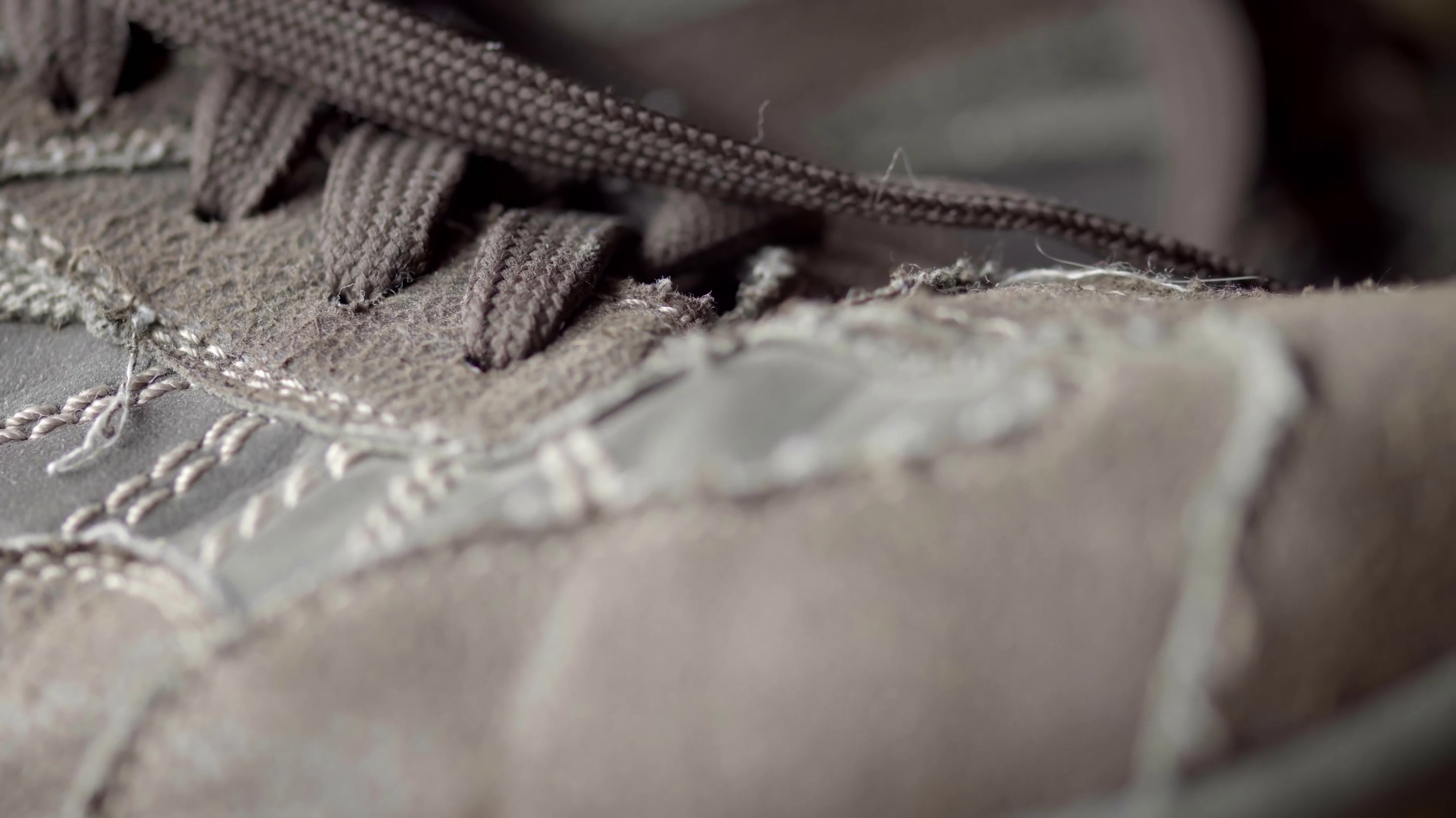 Brown leather shoe in extreme close up UHD stock footage. True macro ...