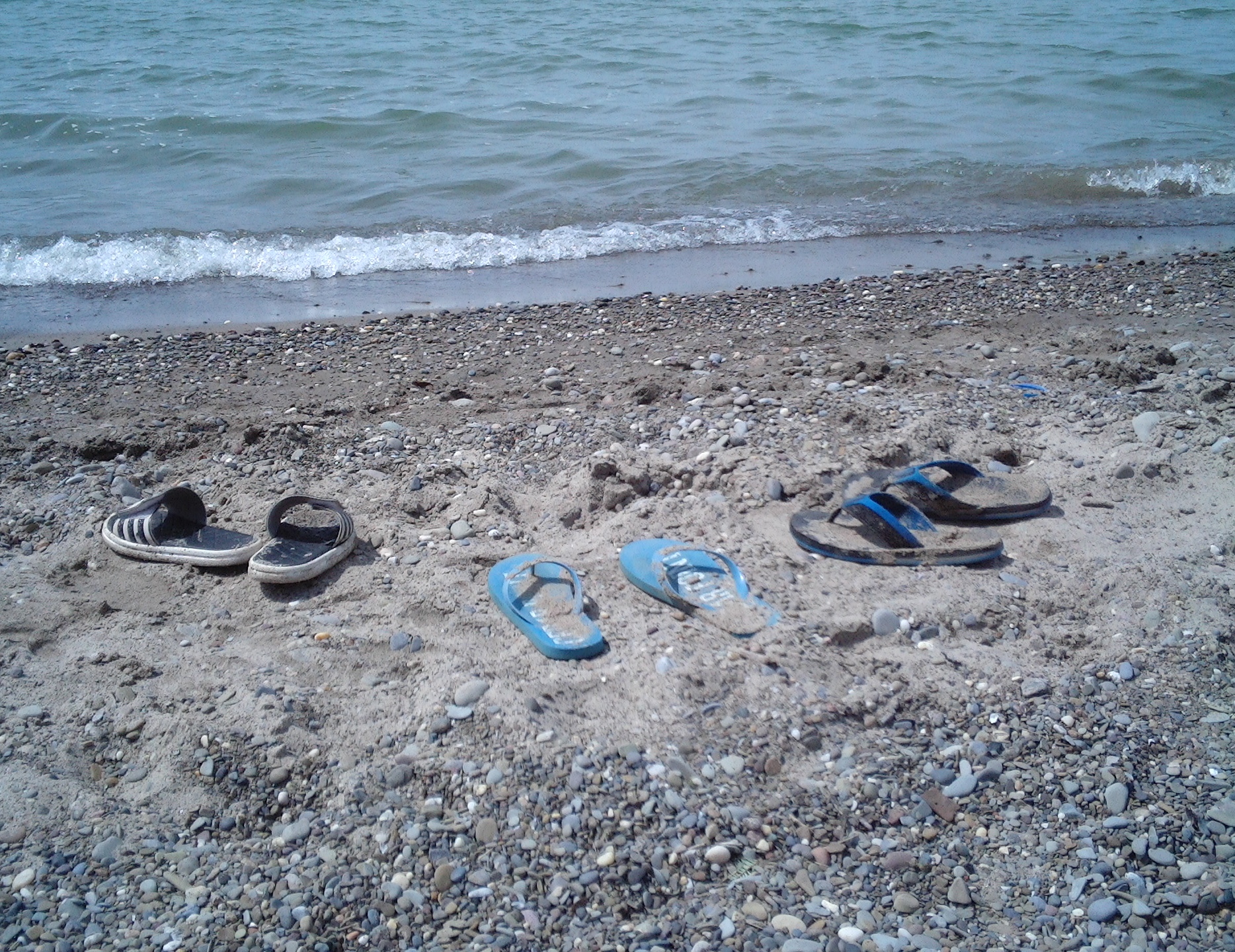 Shoes on the shore photo