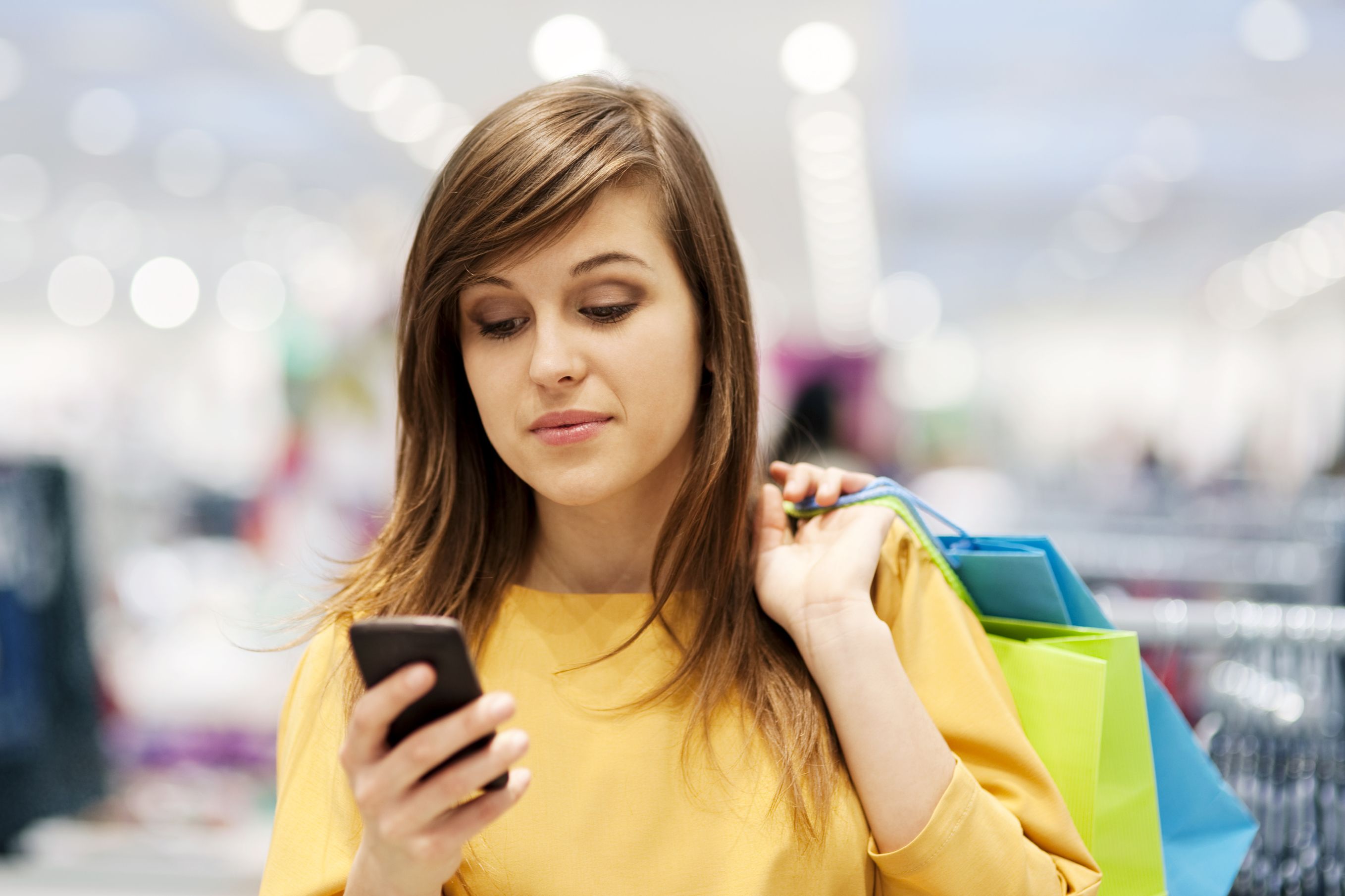 woman shopping and using smartphone | Smartphones usage | Pinterest ...