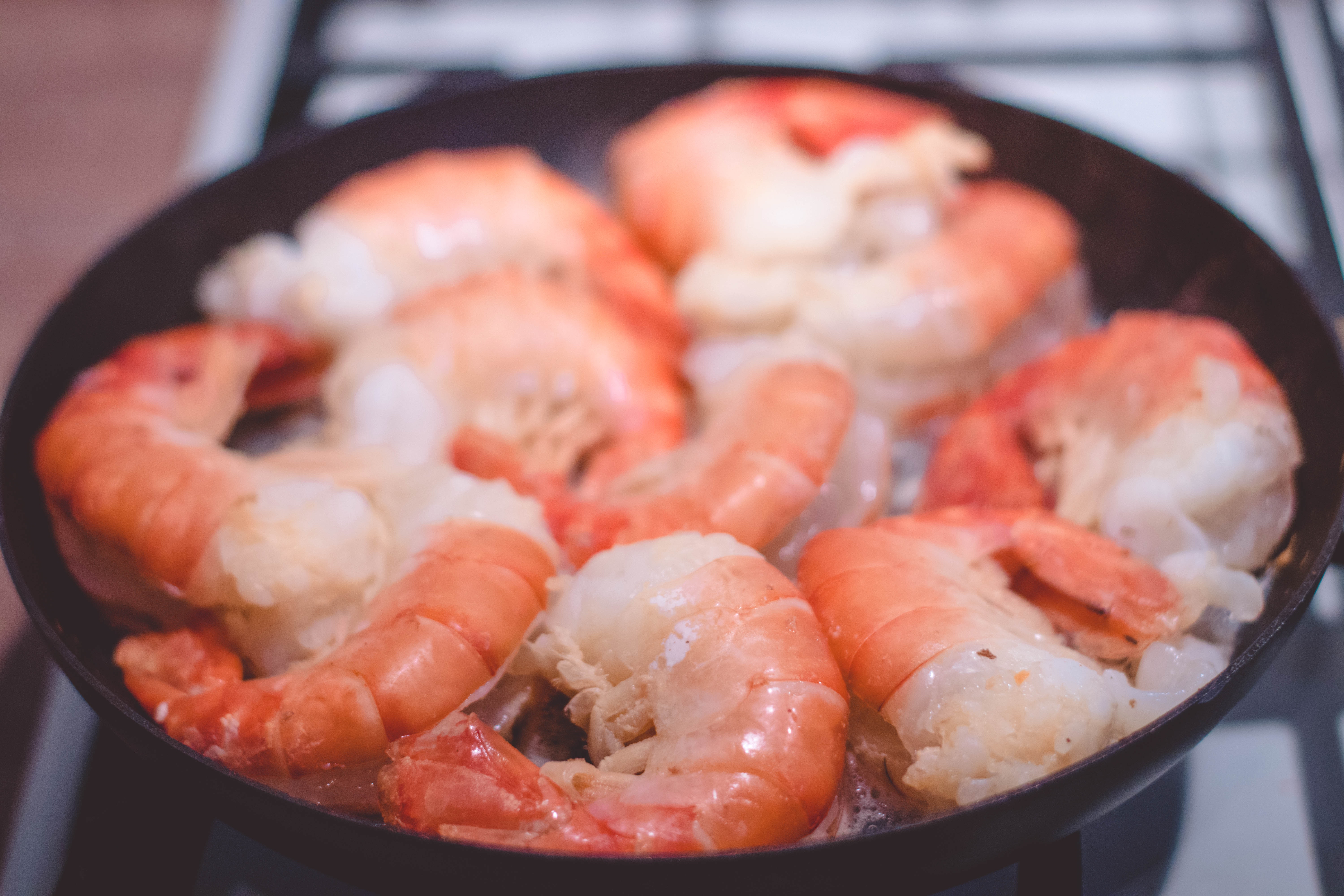 Shrimp on black pan photo