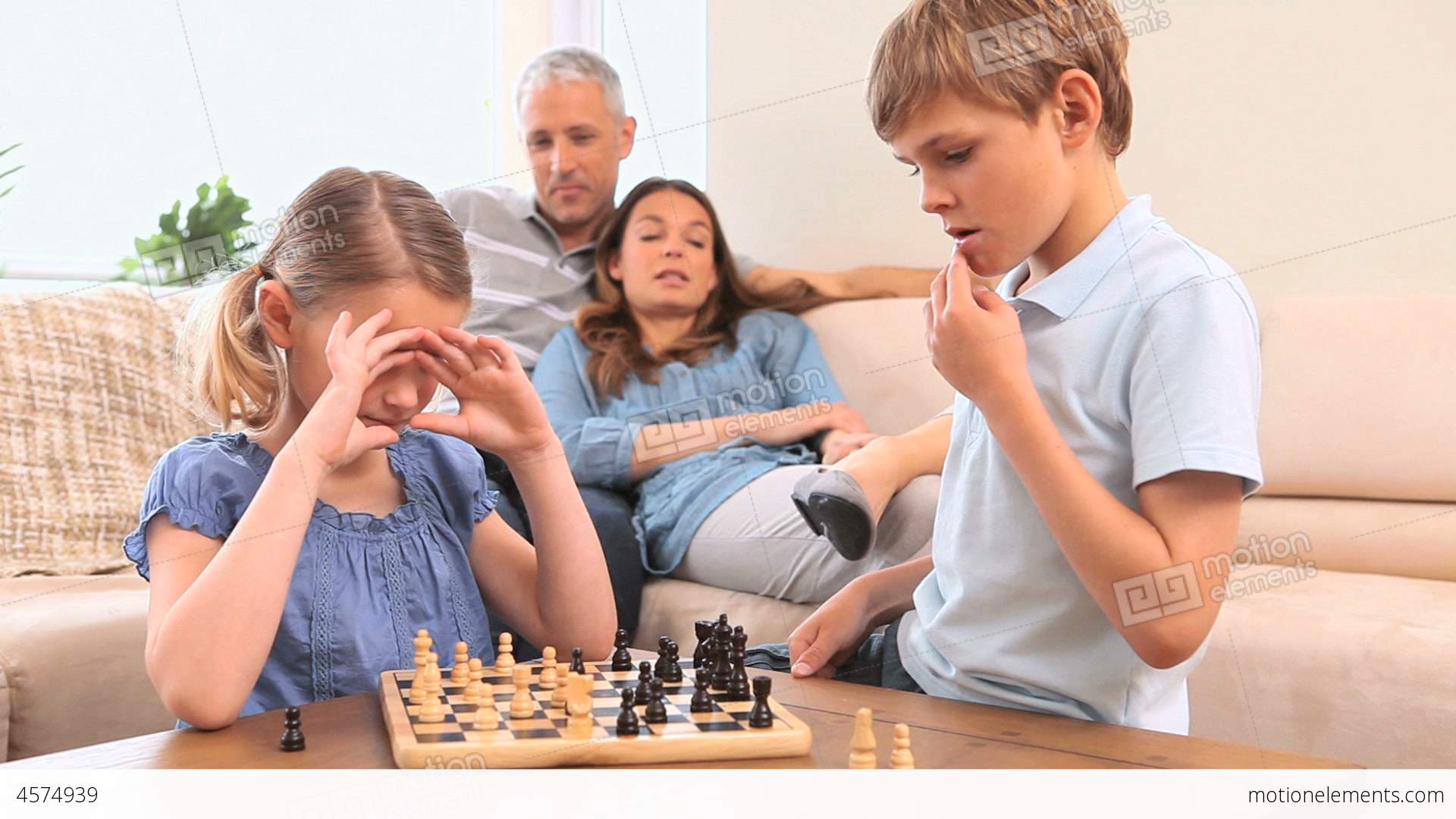 Serious Siblings Playing Chess Stock video footage | 4574939