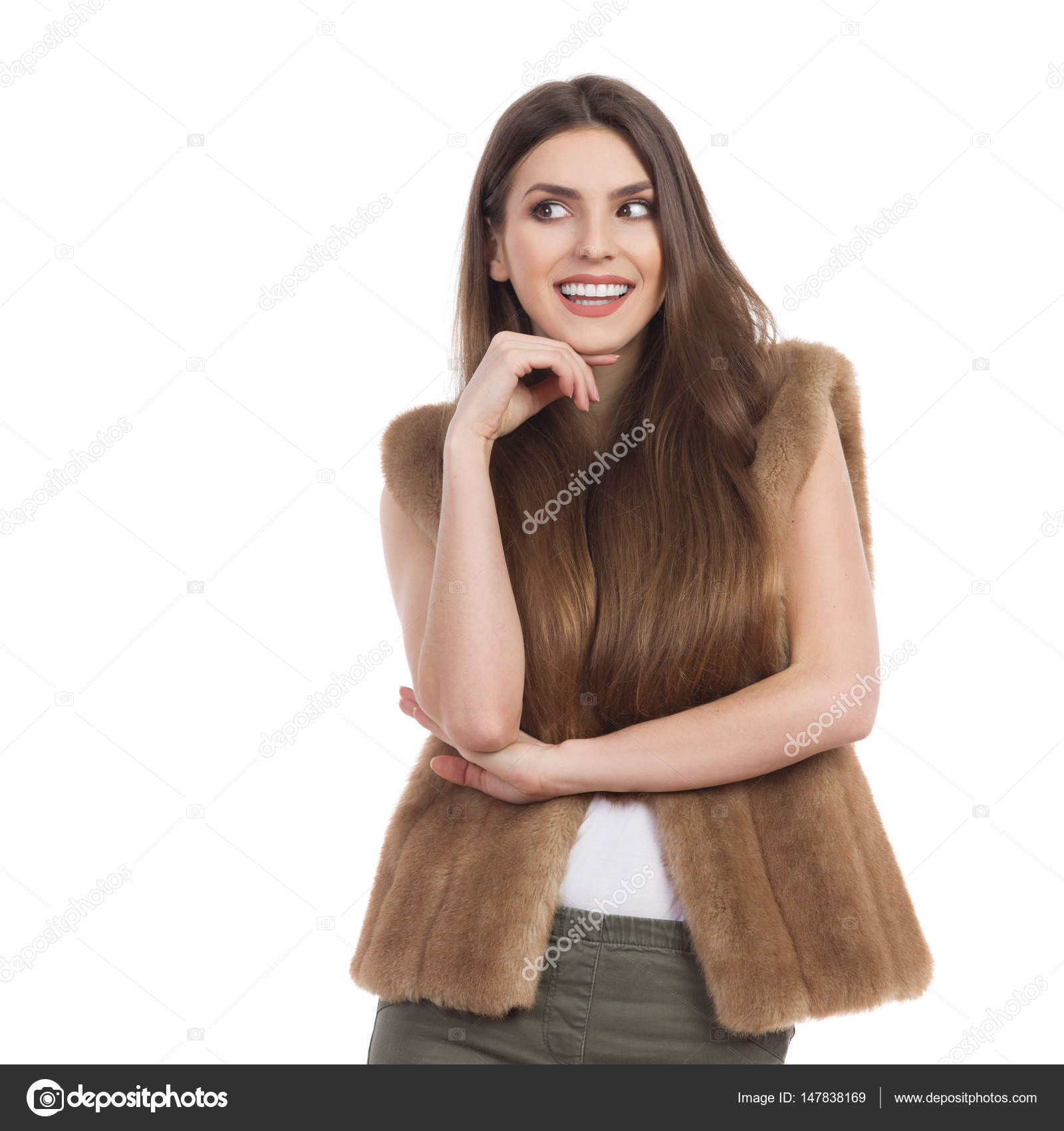 Smiling And Curious Girl In Fur Vest Sideways Glance — Stock Photo ...