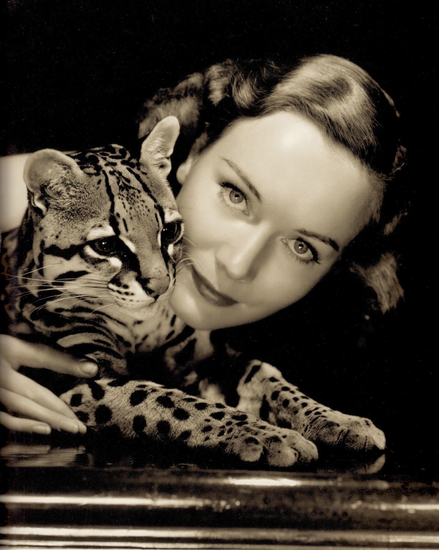 SIGRID GURIE (actress) with her pet ocelot. Photo by GEORHE HURRELL ...