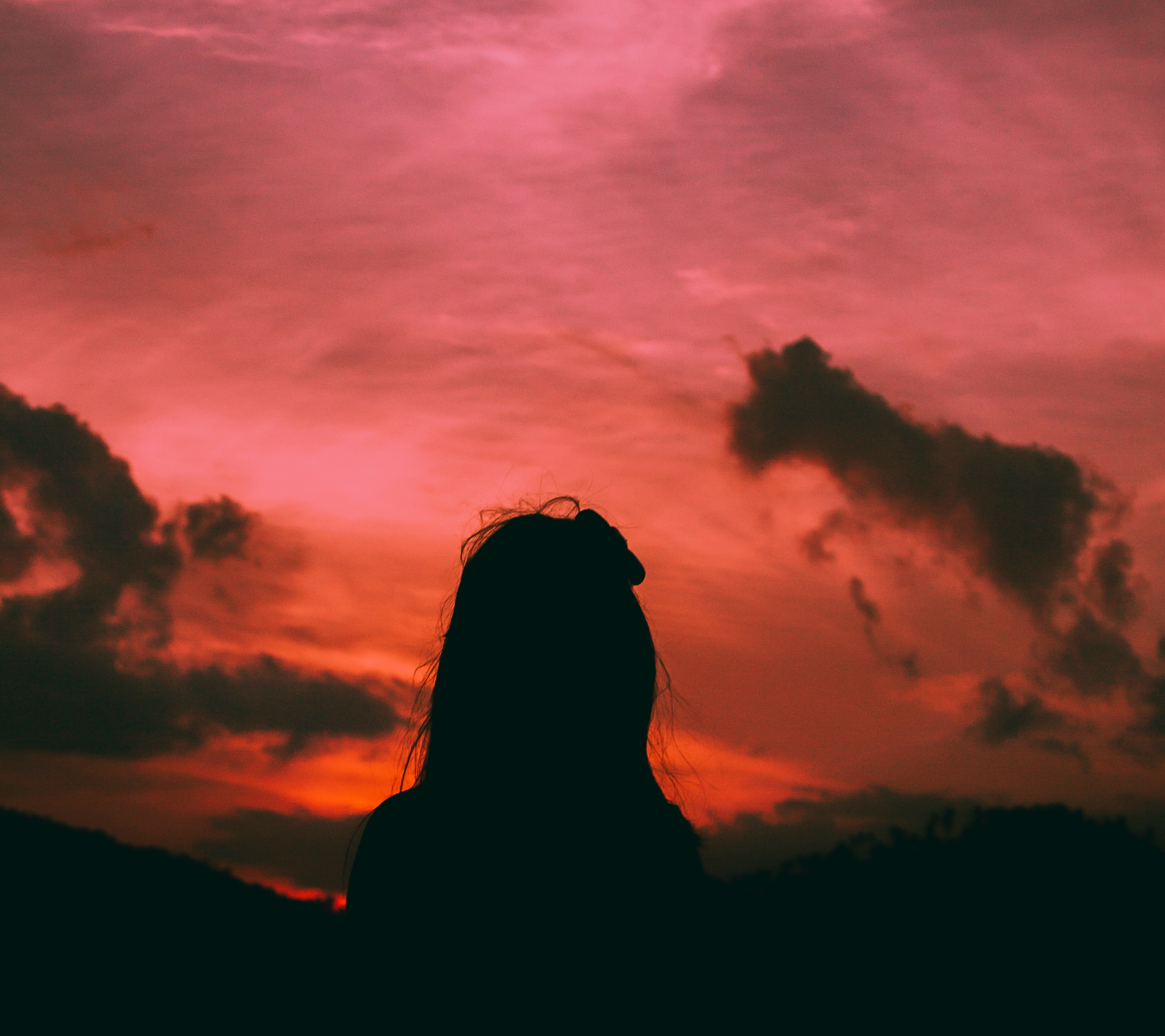 Silhouette of a woman during dawn photo