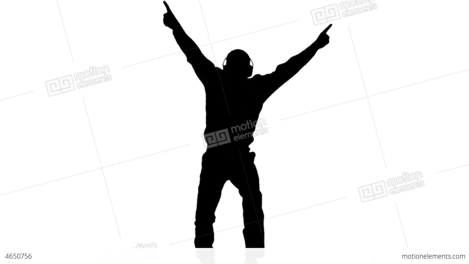 Silhouette Of A Man Enjoying Music And Jumping On Stock video ...
