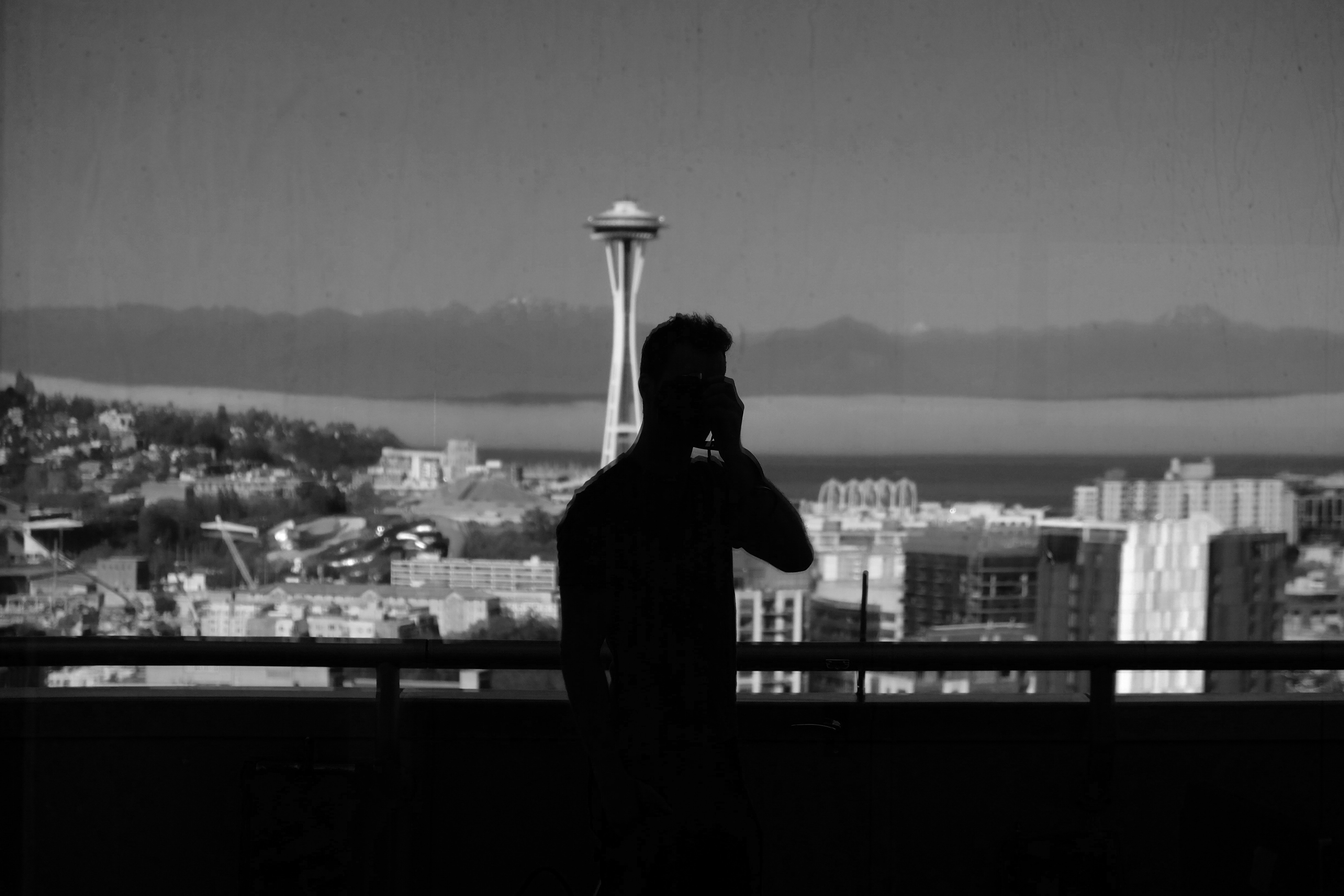 Silhouette of man near handrails photo