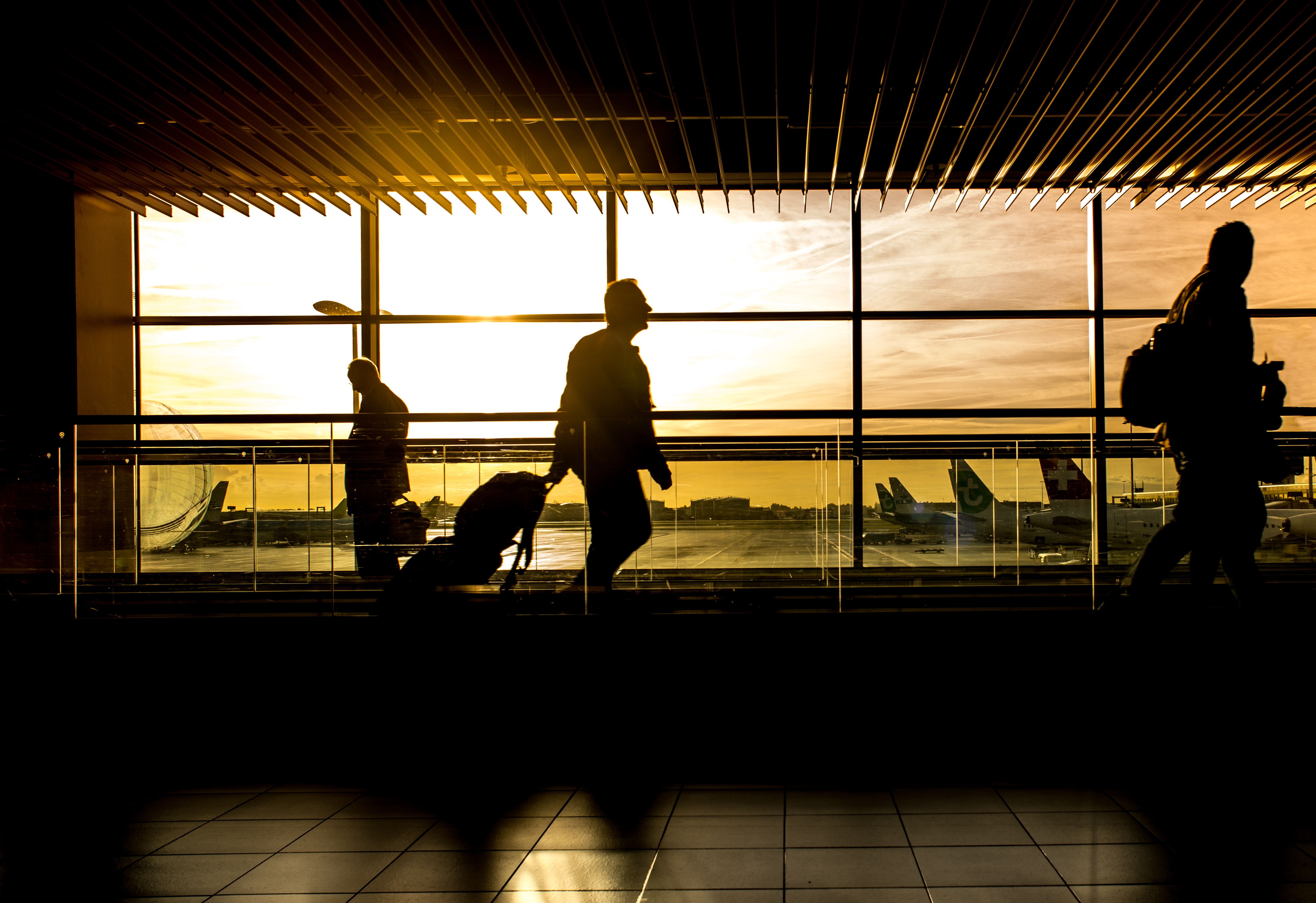 Silhouette of person in airport photo