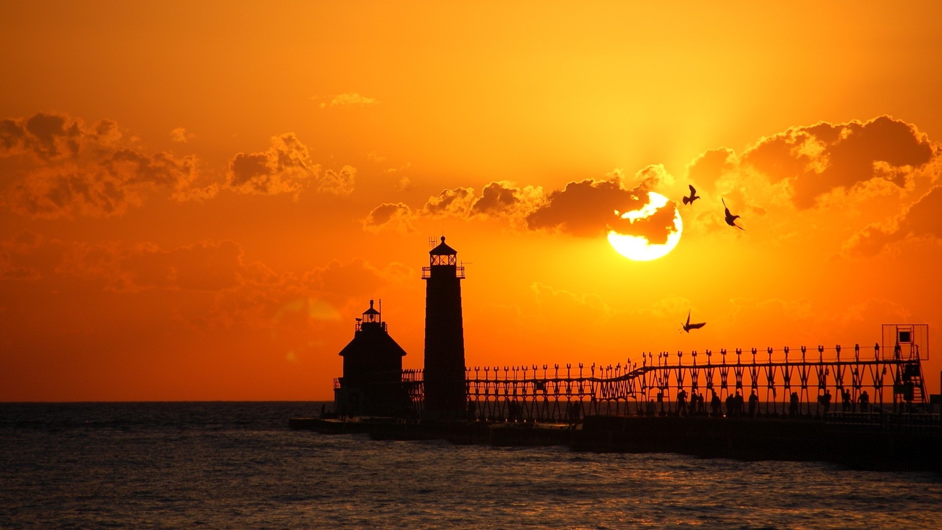 Lighthouses: Lighthouse Enveloped Silhouette Black Sea Low Orange ...