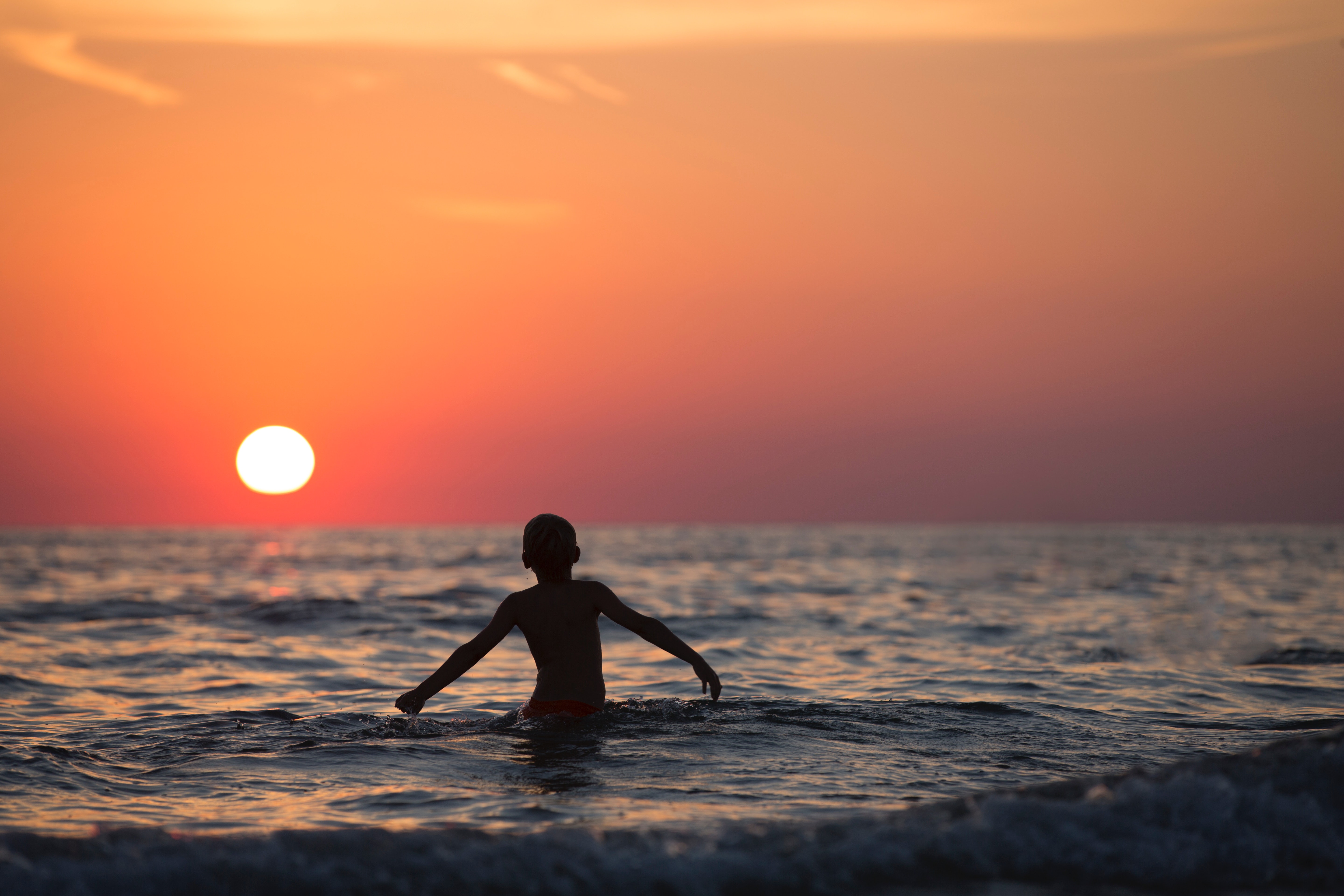 Silhouette Photo of Child on Body of Water during Golden Hour, Beach, Recreation, Water, Swimming, HQ Photo