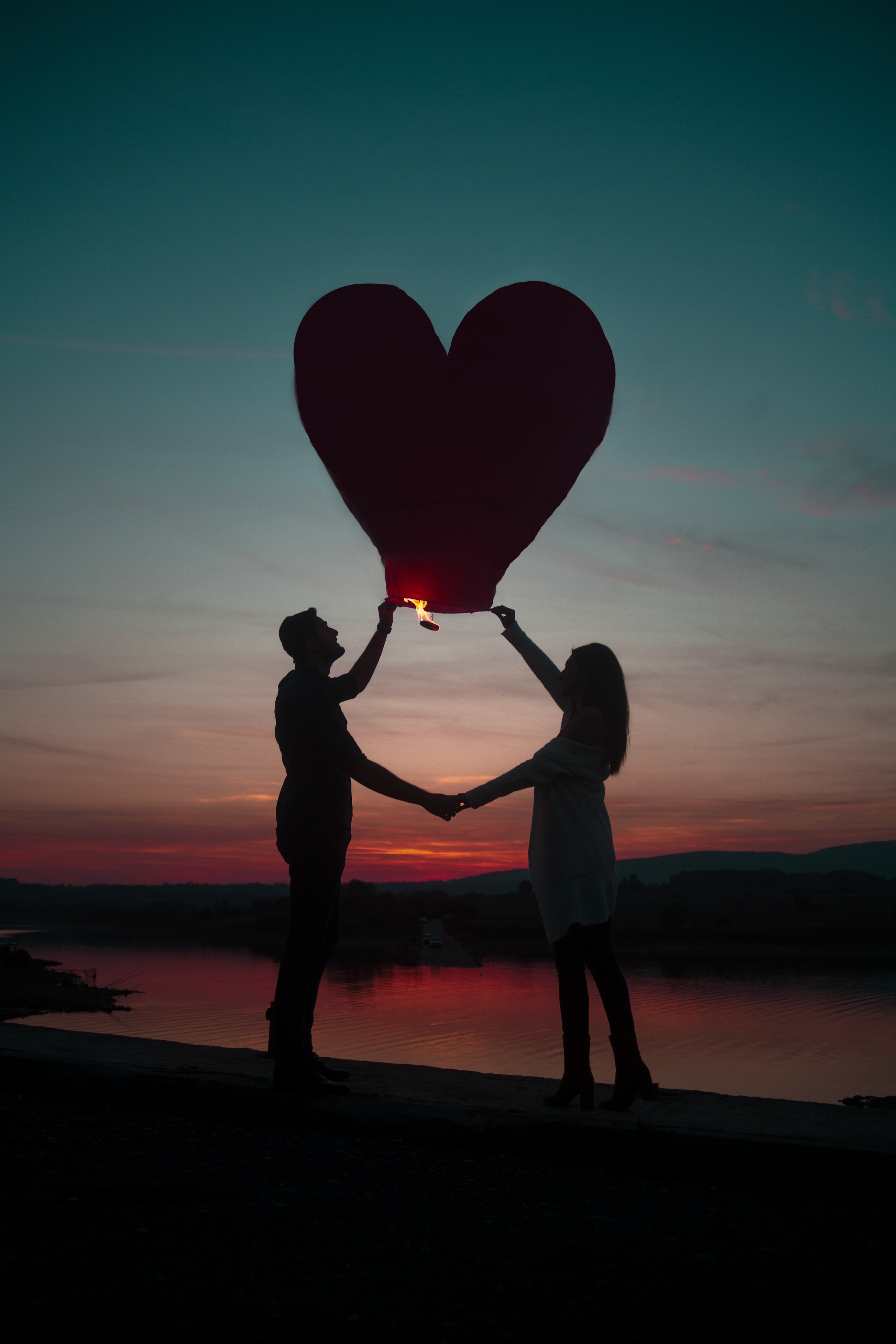 Silhouette Photo Of Man And Woman Holding Heart Lantern, Justifyyourlove, Water, Sunset, Silhouette, HQ Photo
