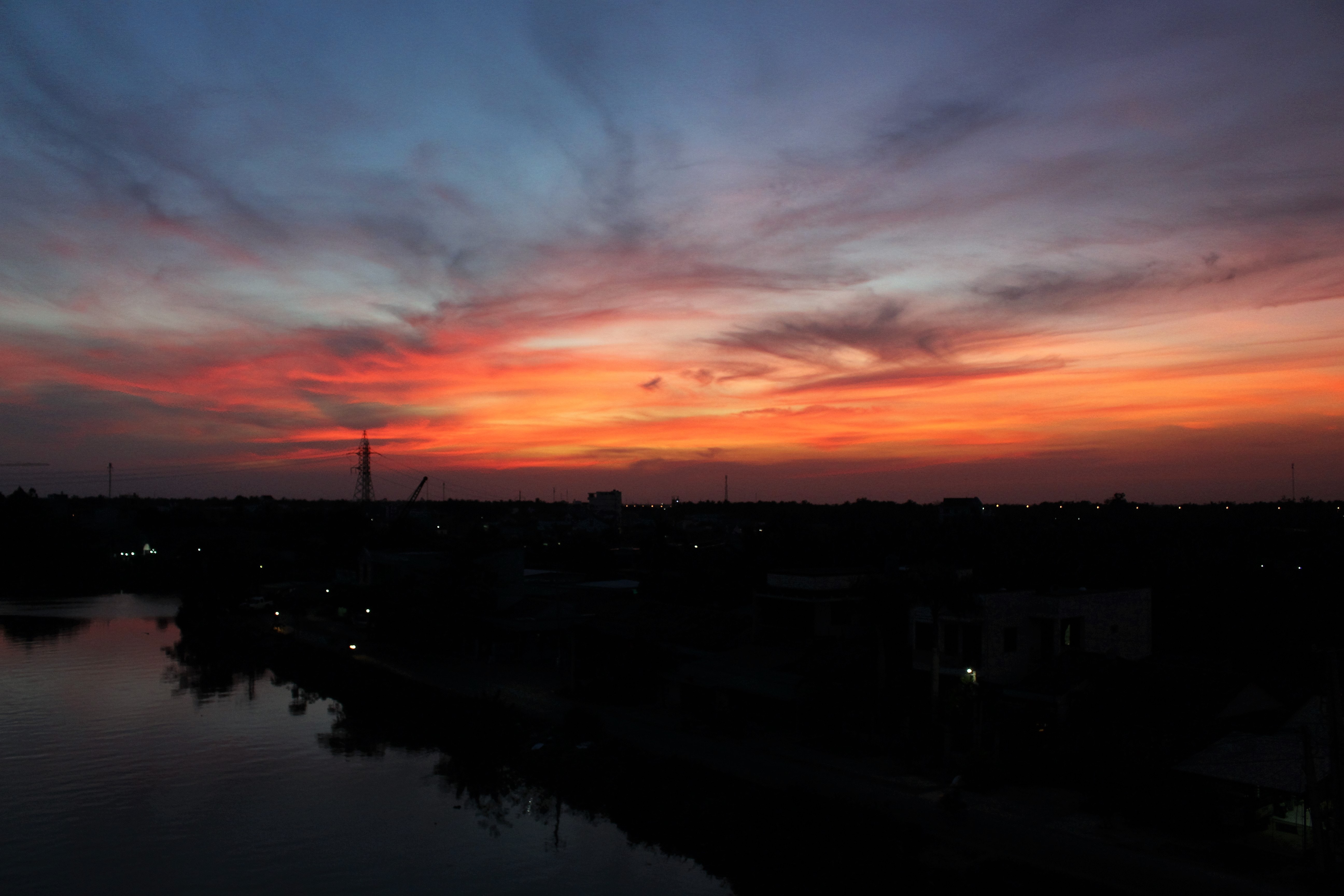 Silhouette Photo of Skyline Building Below Orange and Blue Sky, Dawn, Dusk, Evening, Lake, HQ Photo