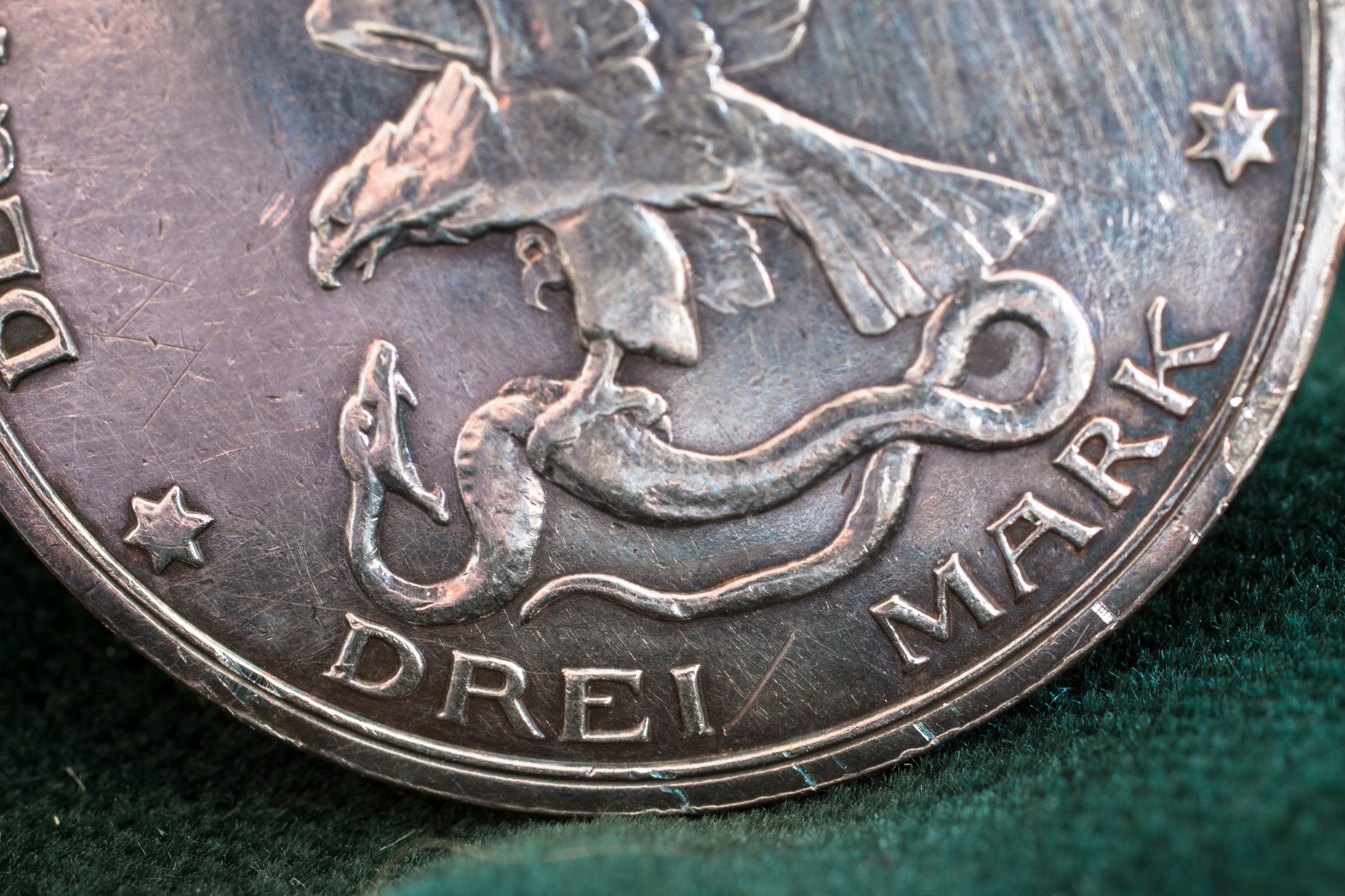 Silver coin bottom close-up photo