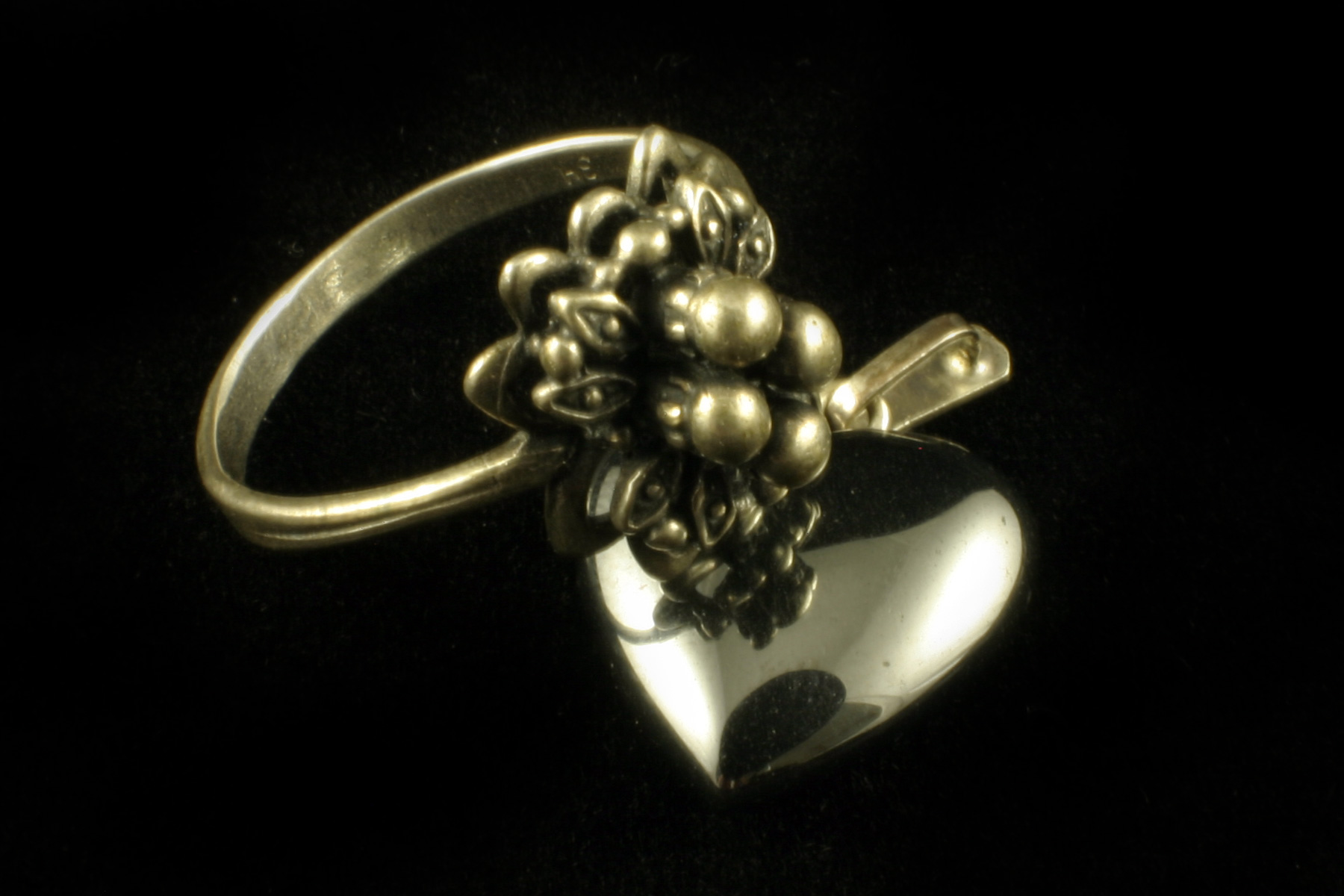 Silver ring and heart photo
