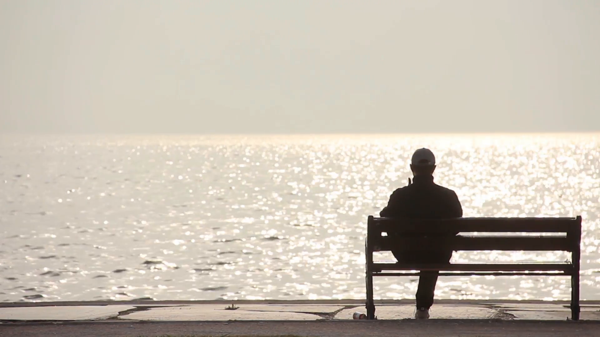 Alone Man Sitting On The Beach Stock Video Footage - Videoblocks